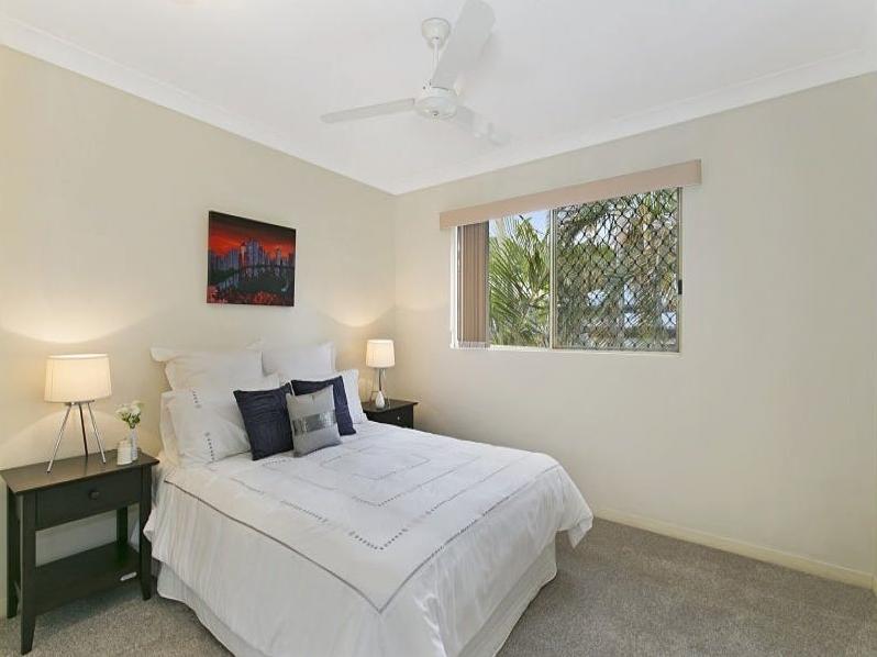 Modern Two-Bedroom Townhouse with Double Lock-Up Garage in Prime Toowong Location