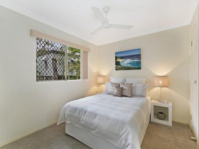 Modern Two-Bedroom Townhouse with Double Lock-Up Garage in Prime Toowong Location