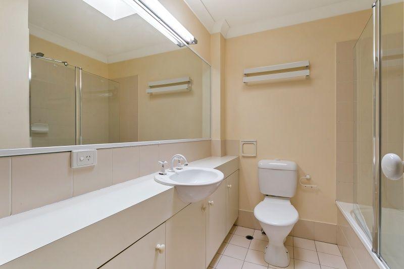 SPACIOUS THREE LEVEL TOWNHOUSE