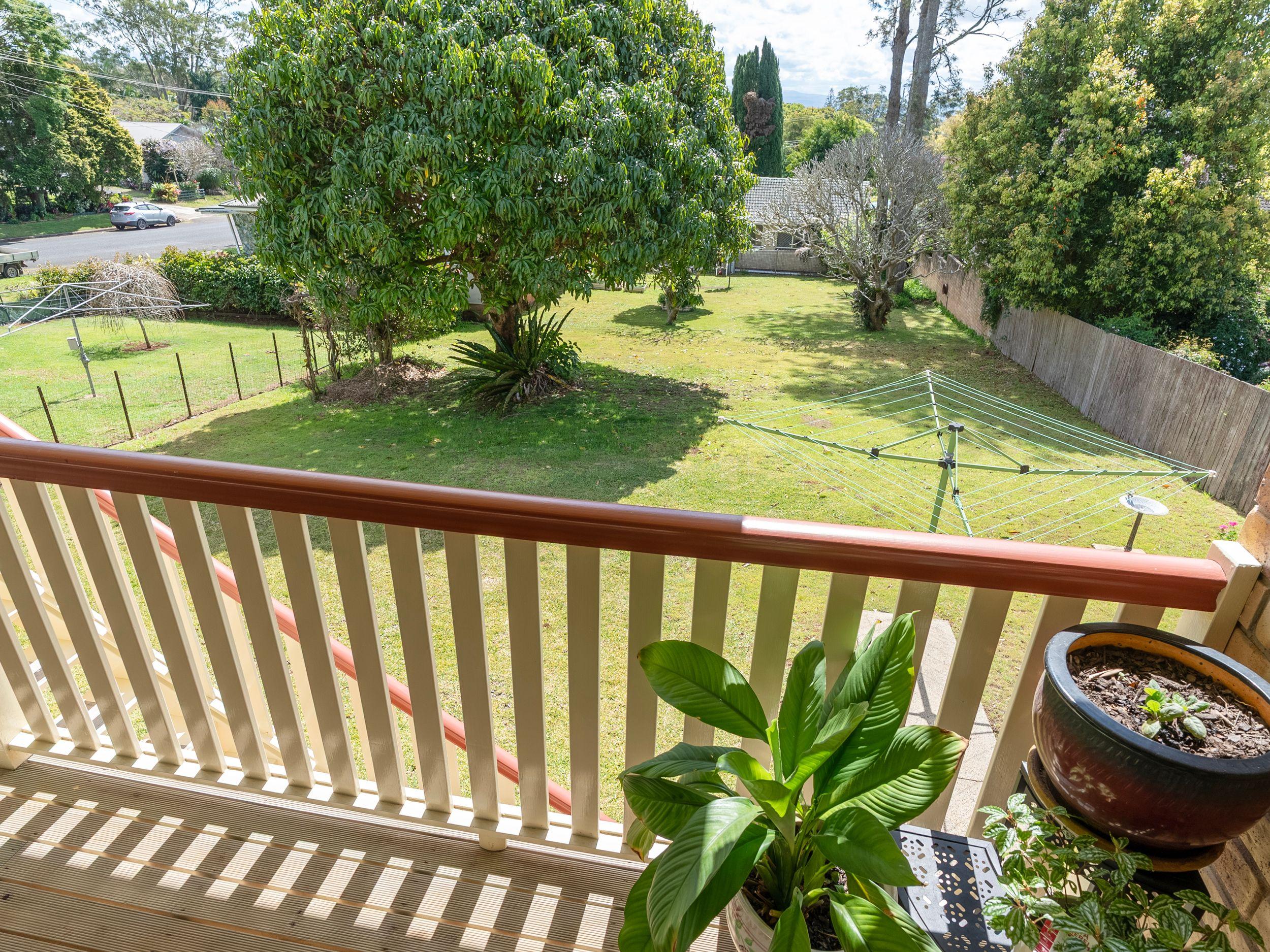 Spacious Family Home with Covered Deck and Convenient Location