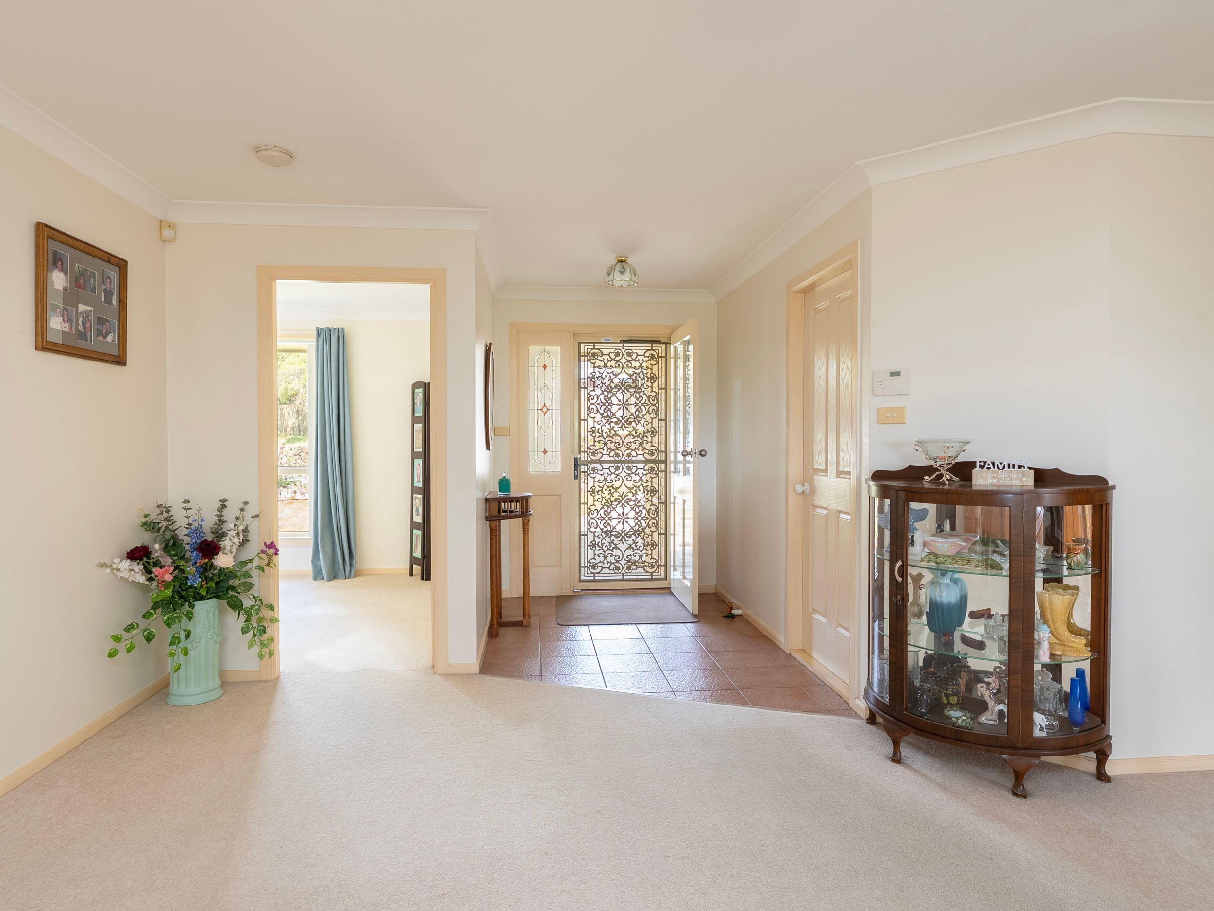 Spacious Family Home with Covered Deck and Convenient Location