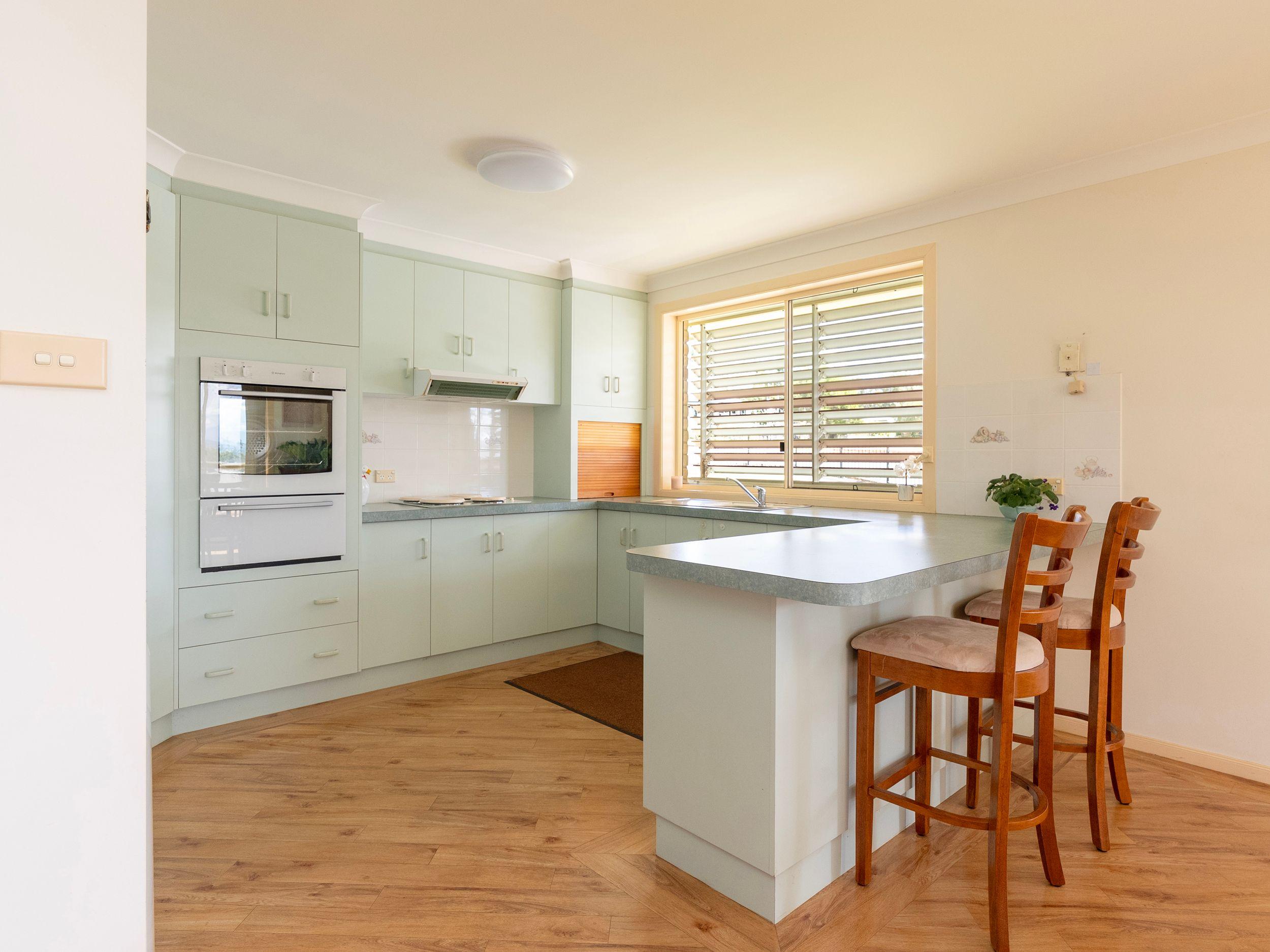 Spacious Family Home with Covered Deck and Convenient Location