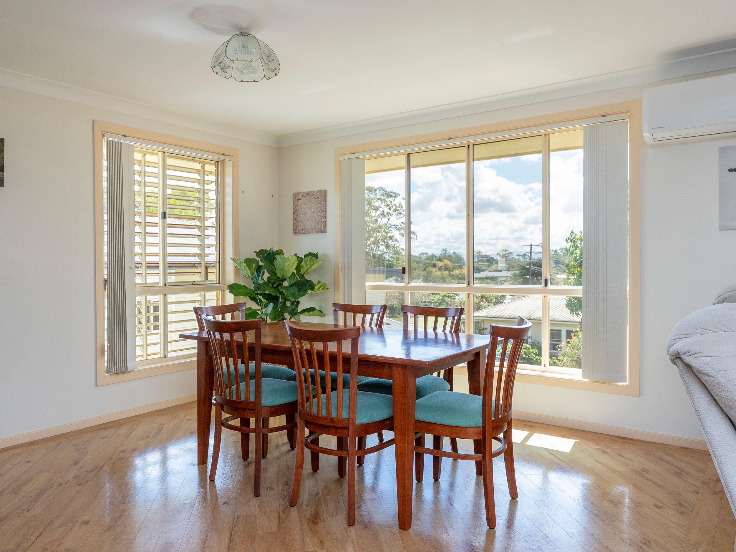 Spacious Family Home with Covered Deck and Convenient Location
