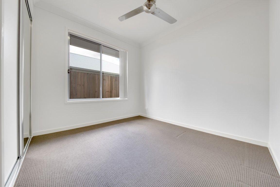 LOOKS GOOD, FEELS GREAT!  IDEAL LOW MAINTENANCE 4 BEDROOM RESIDENCE