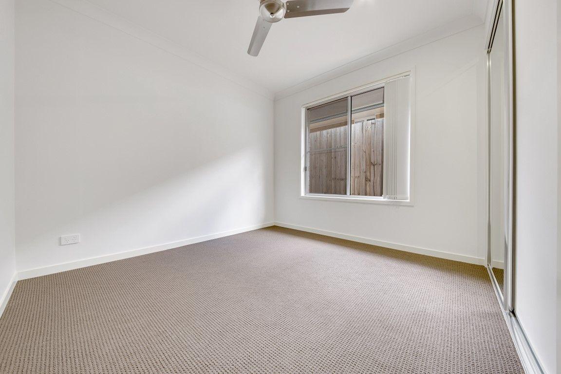 LOOKS GOOD, FEELS GREAT!  IDEAL LOW MAINTENANCE 4 BEDROOM RESIDENCE