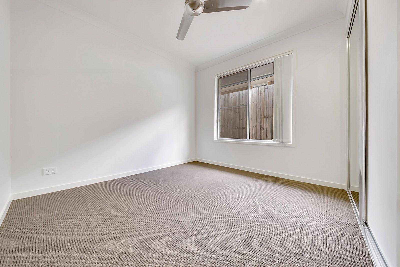 LOOKS GOOD, FEELS GREAT!  IDEAL LOW MAINTENANCE 4 BEDROOM RESIDENCE