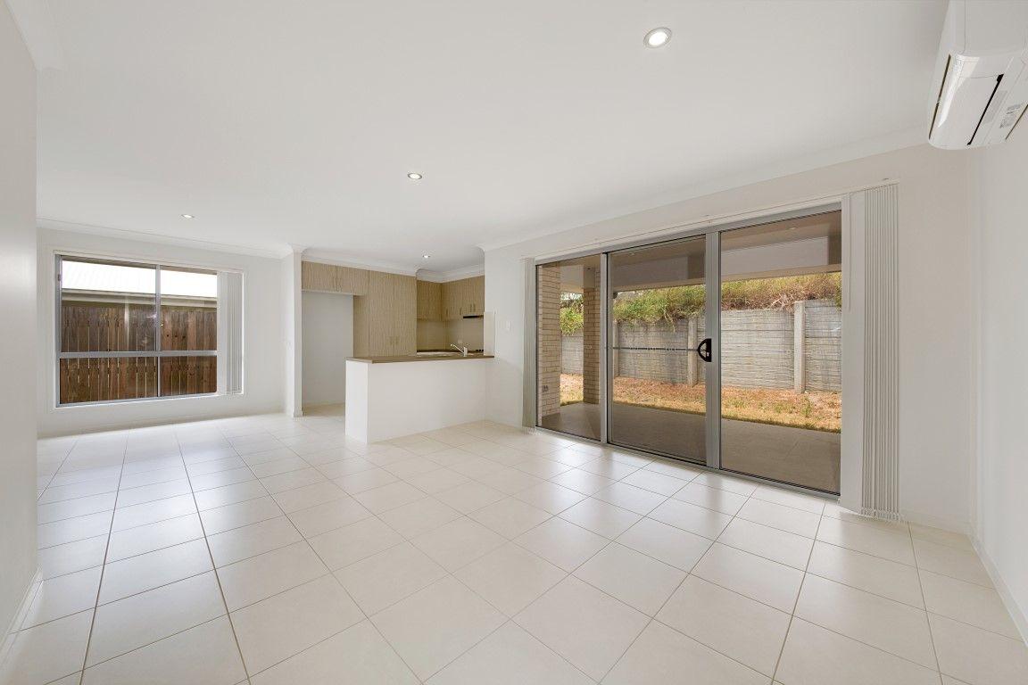 LOOKS GOOD, FEELS GREAT!  IDEAL LOW MAINTENANCE 4 BEDROOM RESIDENCE