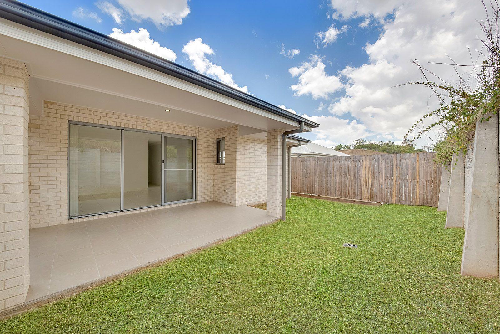 LOOKS GOOD, FEELS GREAT!  IDEAL LOW MAINTENANCE 4 BEDROOM RESIDENCE