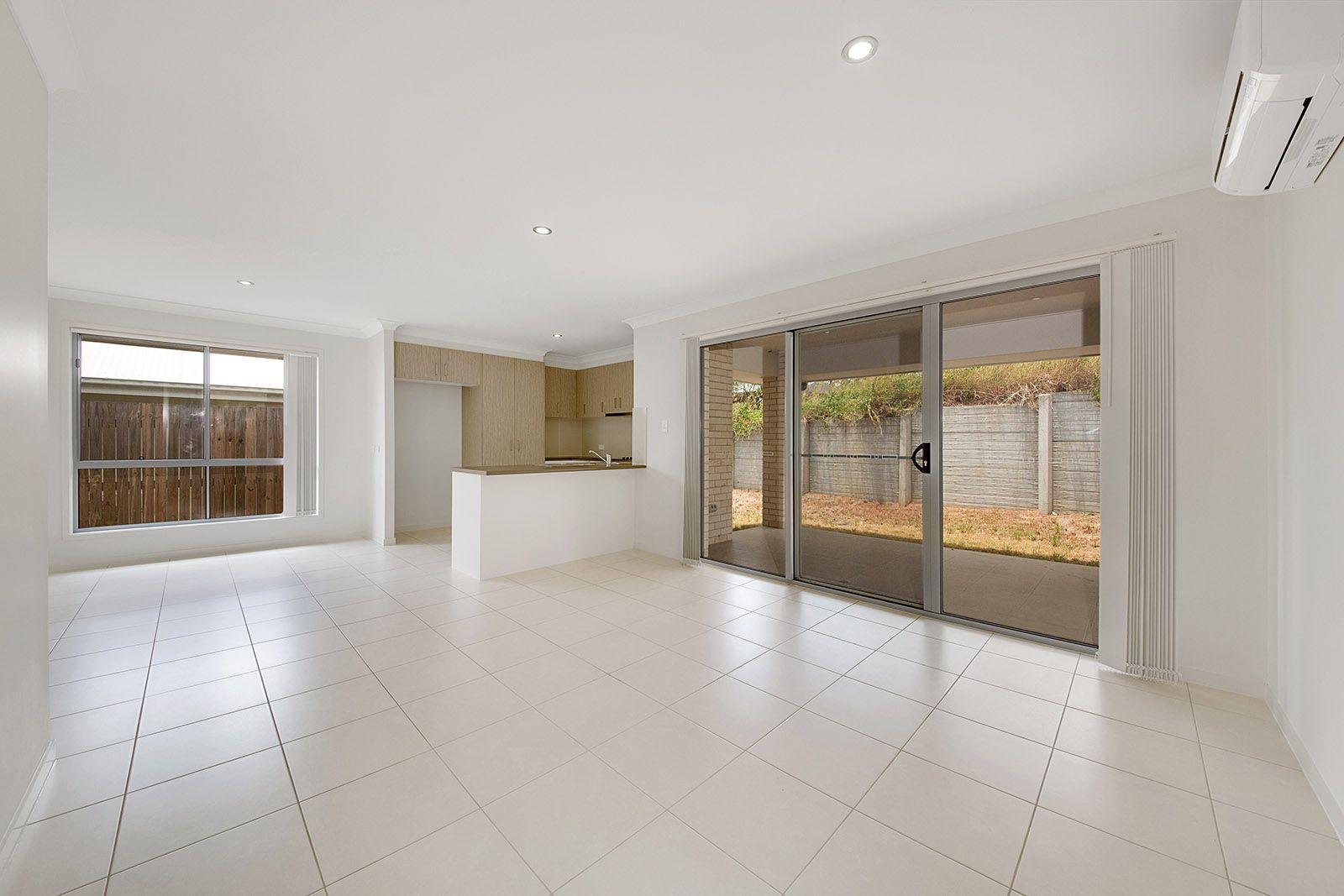 LOOKS GOOD, FEELS GREAT!  IDEAL LOW MAINTENANCE 4 BEDROOM RESIDENCE