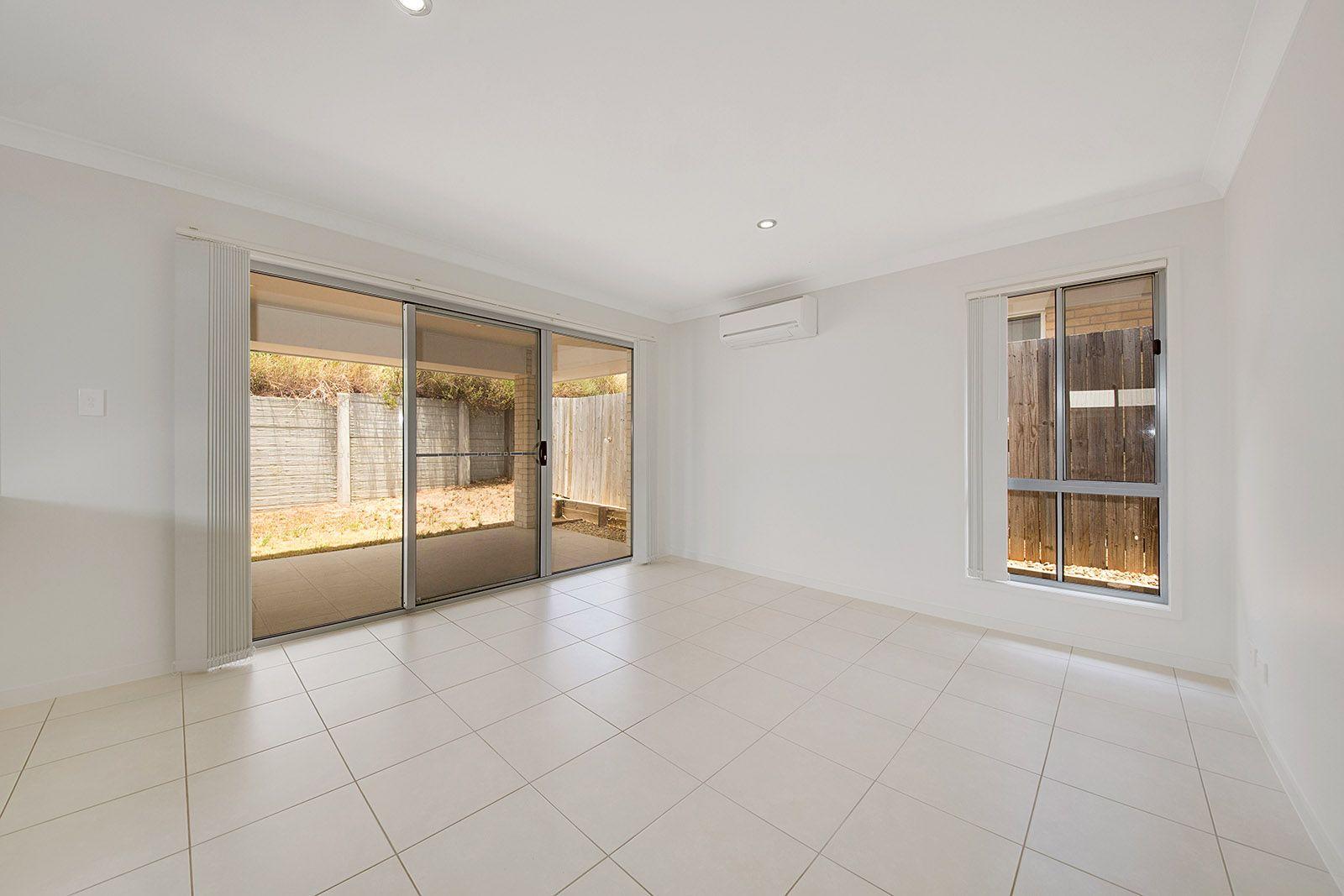 LOOKS GOOD, FEELS GREAT!  IDEAL LOW MAINTENANCE 4 BEDROOM RESIDENCE