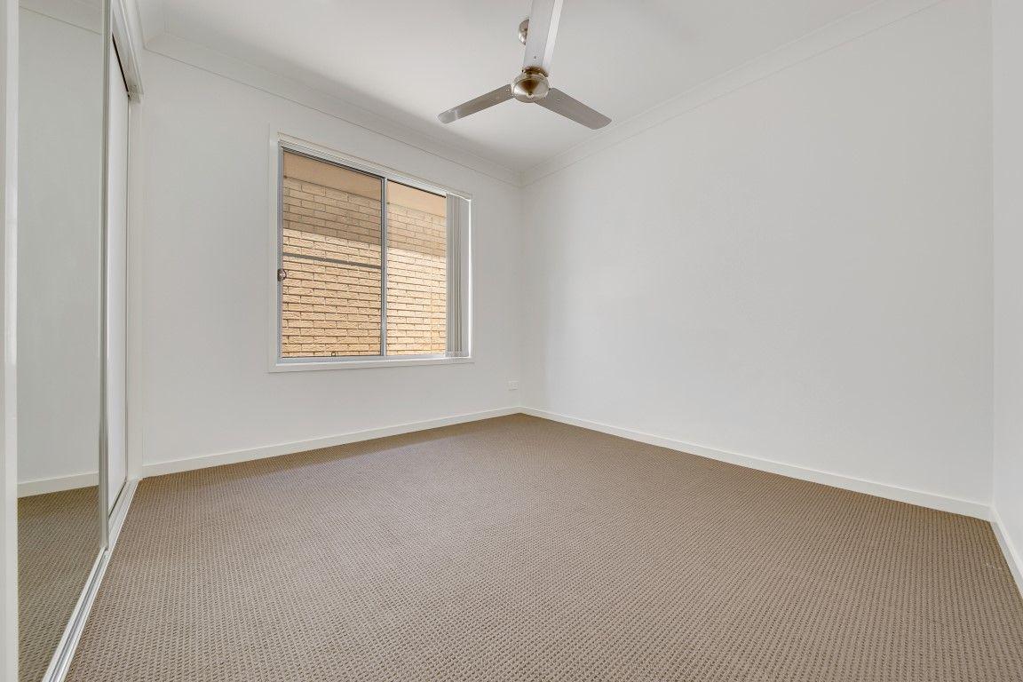 LOOKS GOOD, FEELS GREAT!  IDEAL LOW MAINTENANCE 4 BEDROOM RESIDENCE