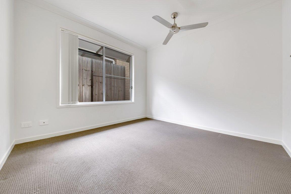 LOOKS GOOD, FEELS GREAT!  IDEAL LOW MAINTENANCE 4 BEDROOM RESIDENCE