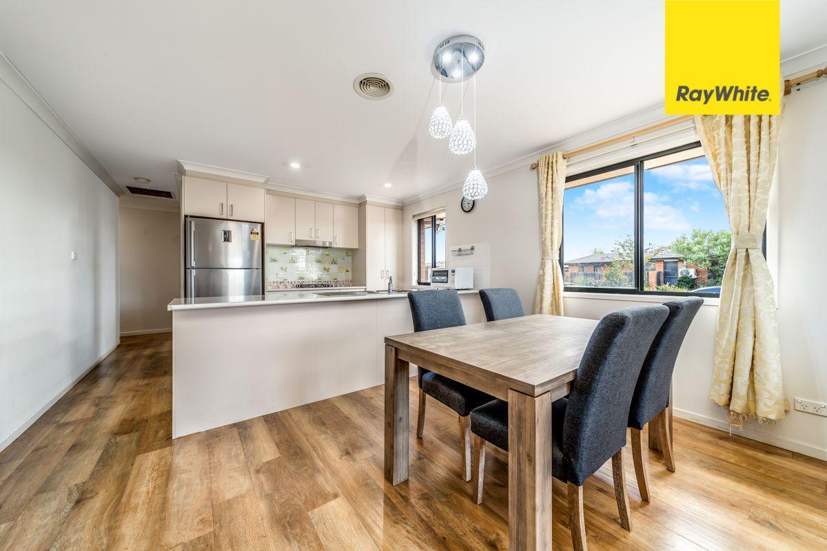 Prop-GPT: House: ACT Macgregor, ACT 2615 Perfectly Polished Living!