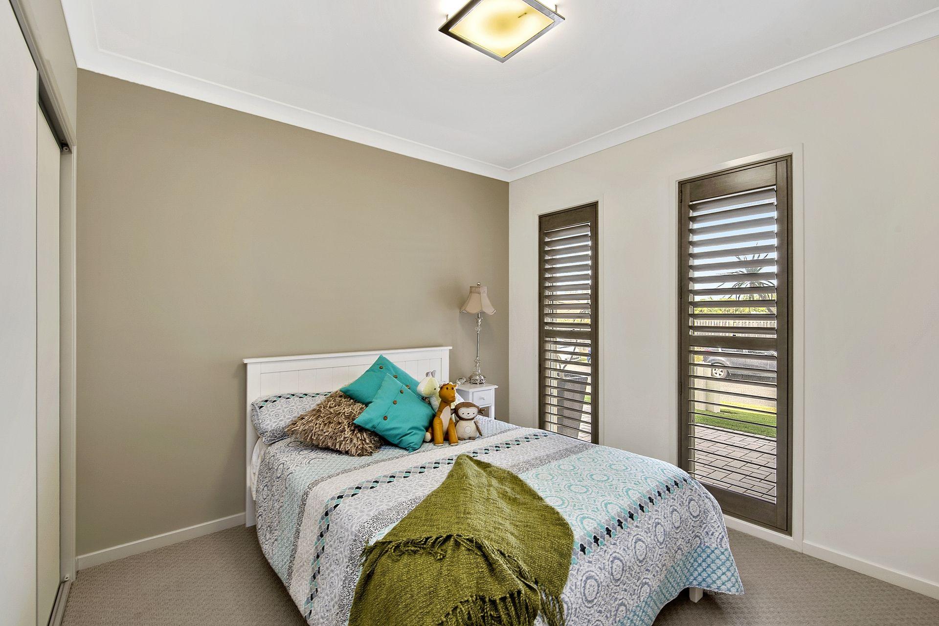 Sophisticated Ex-Display Home offers Spacious, Stylish Living in Highly Convenient Location!