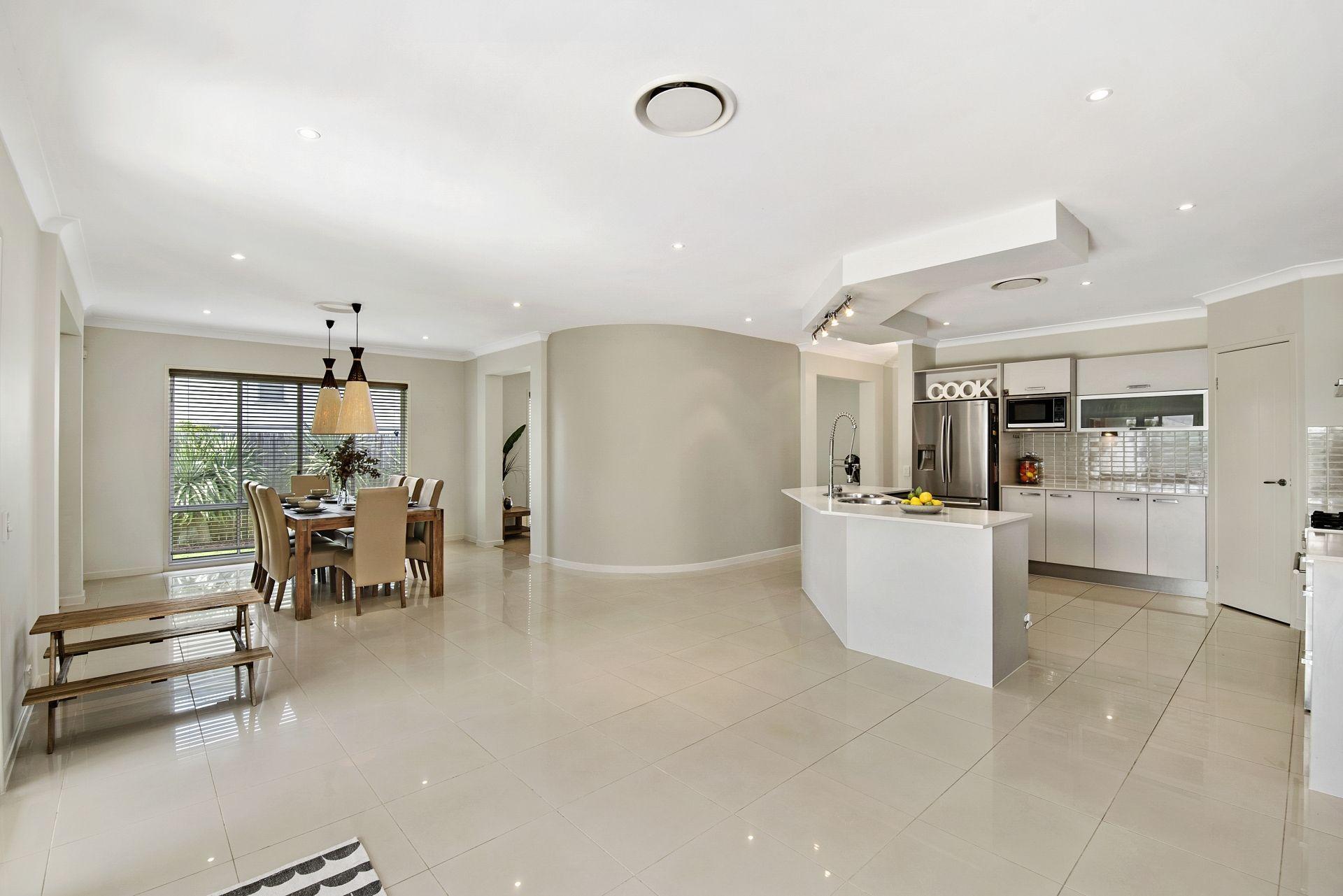 Sophisticated Ex-Display Home offers Spacious, Stylish Living in Highly Convenient Location!