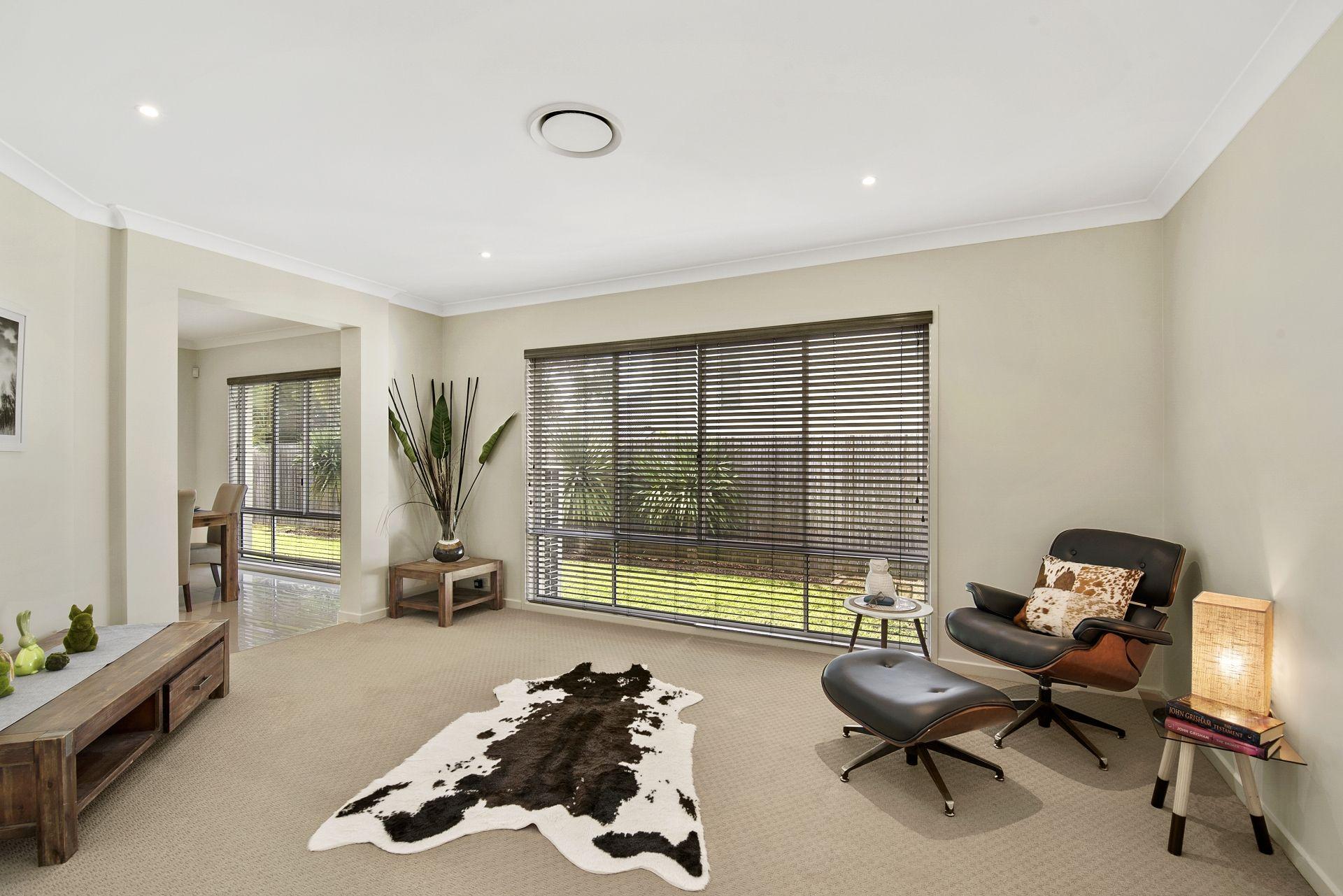 Sophisticated Ex-Display Home offers Spacious, Stylish Living in Highly Convenient Location!