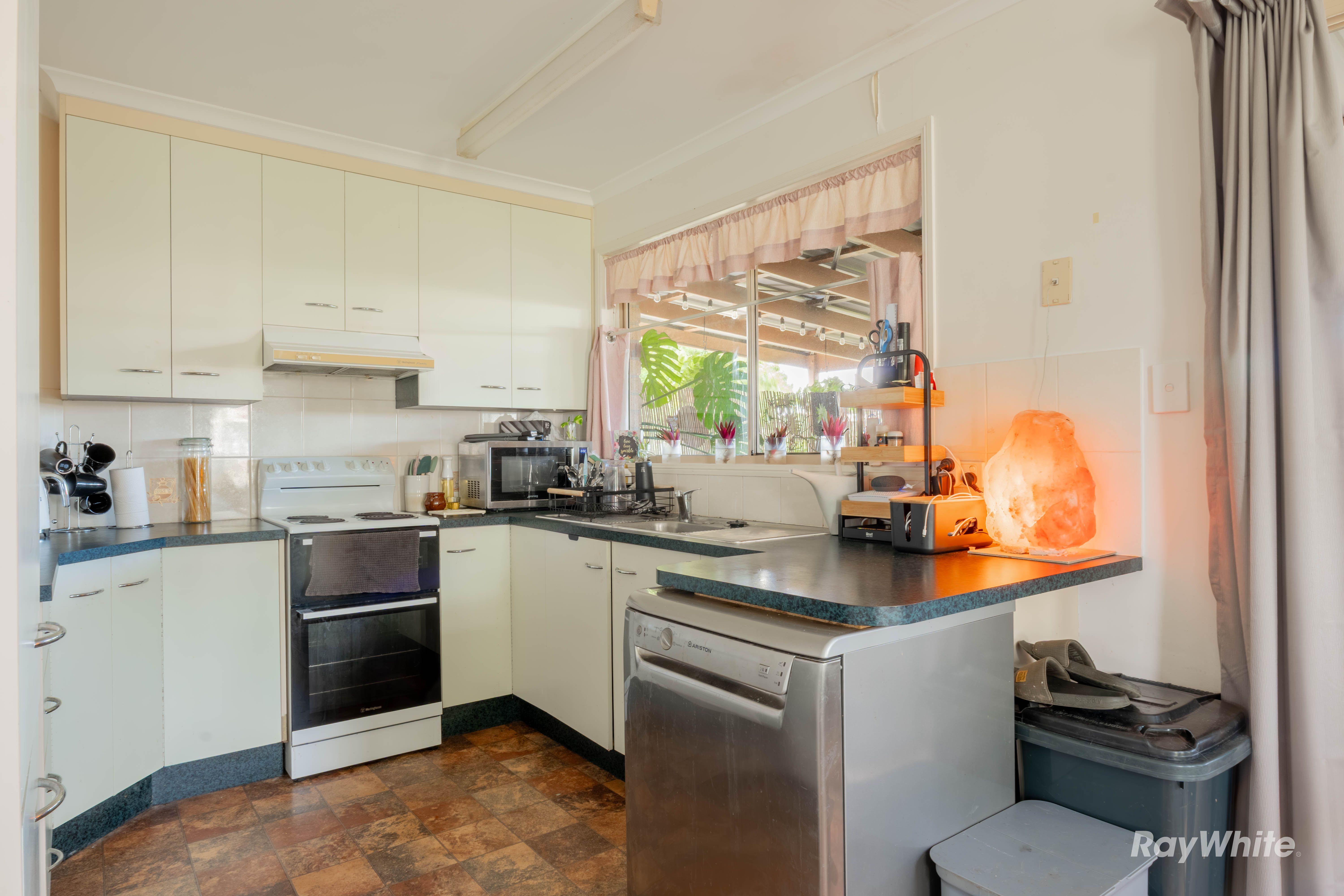 NEAT &  TIDY LOW-SET BRICK HOME