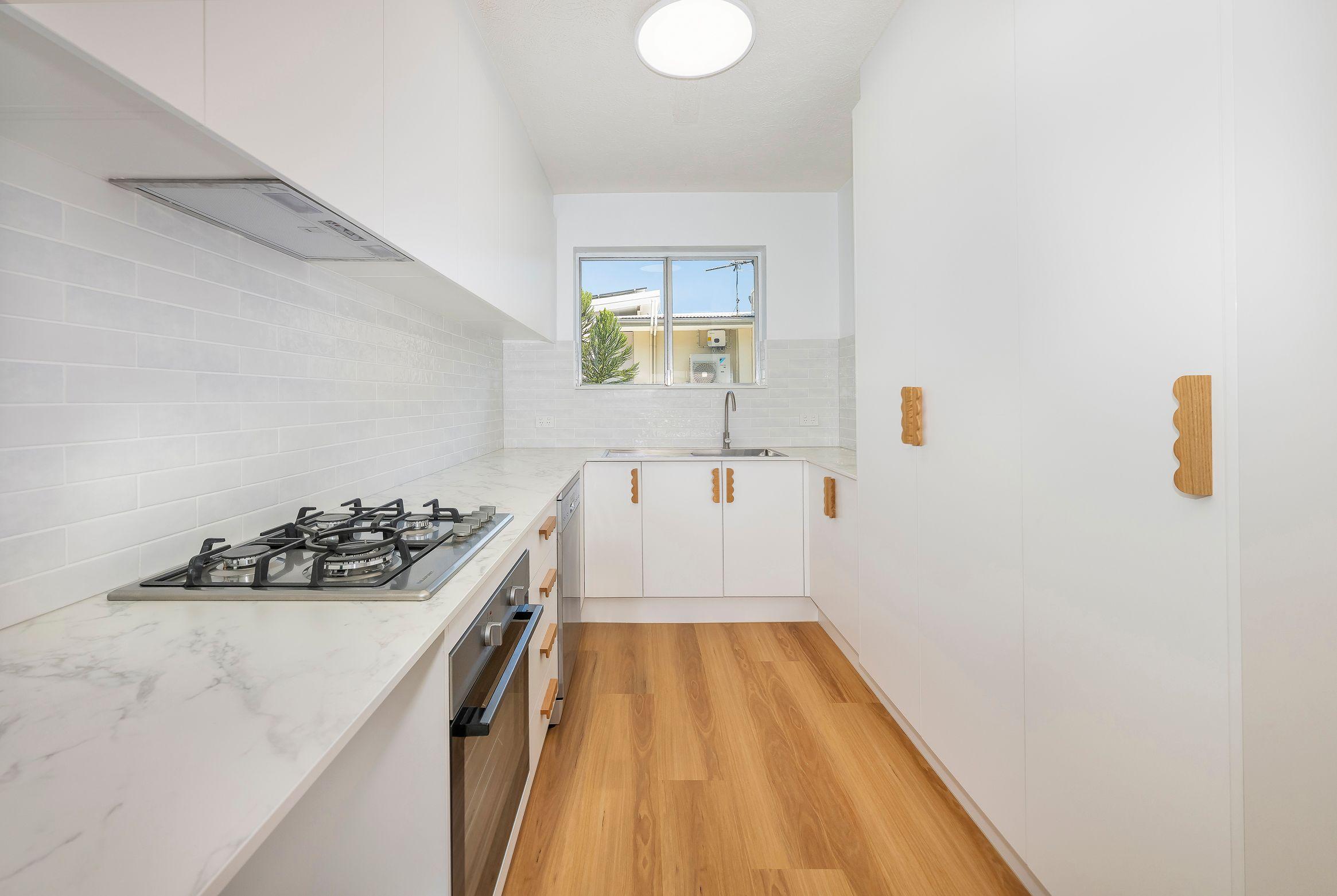 Prop-GPT: Unit: QLD Clayfield, QLD 4011 Stylish Unit in Prime Clayfield Location