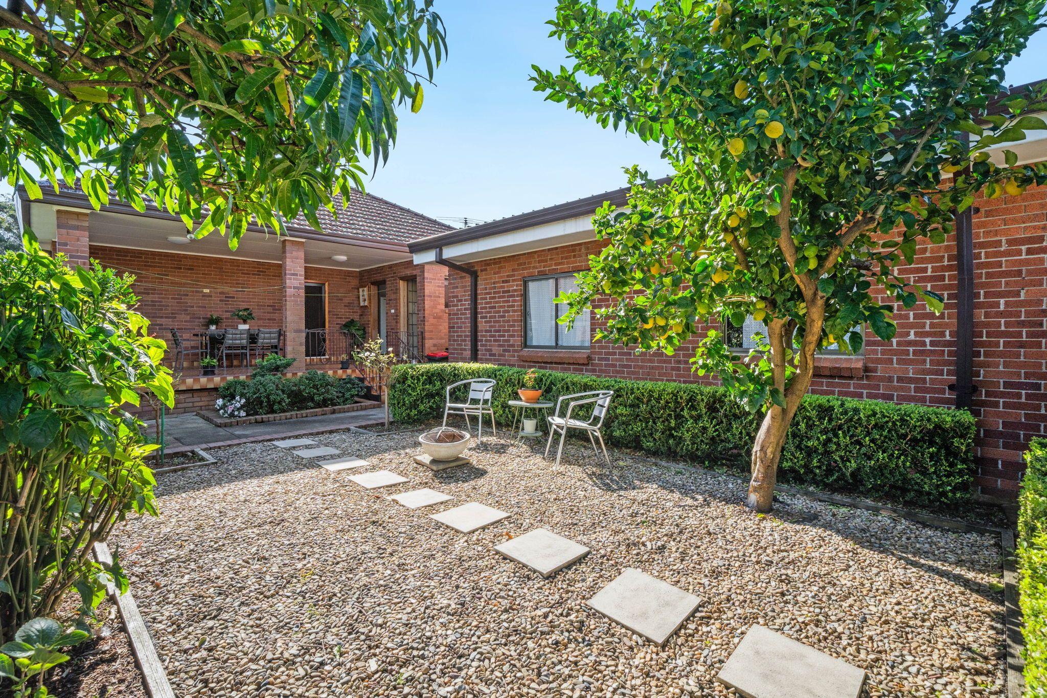 Prop-GPT: House: NSW Punchbowl, NSW 2196 Spacious Full-Brick Home with Large Garage and Prime Punchbowl Location