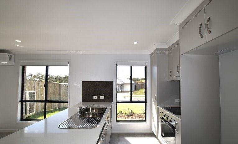 SPACIOUS, MODERN FOUR BEDROOM HOME