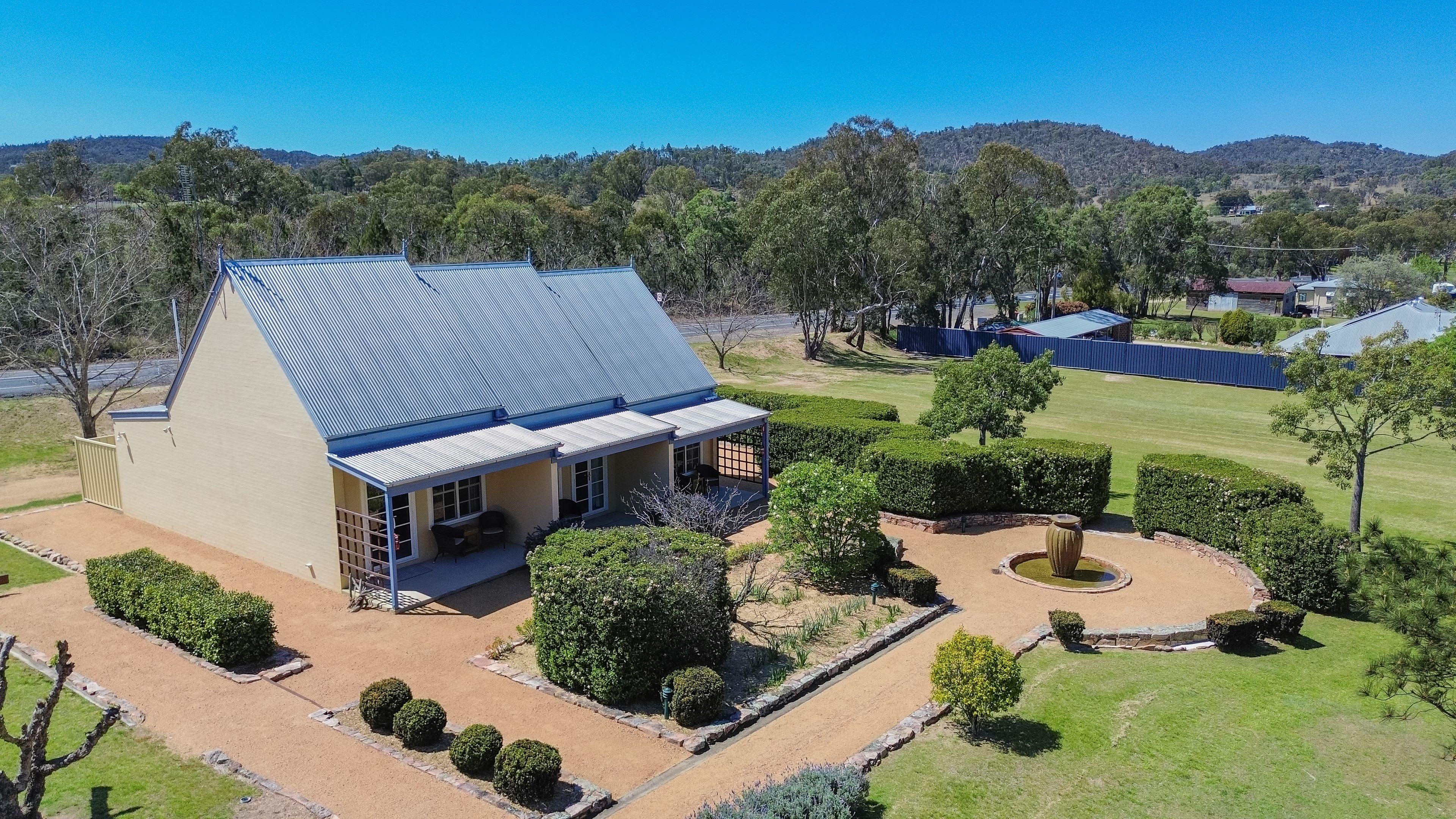 Vineyard Cottages & Café - where country charm meets commercial opportunity at the gateway to Queensland's Granite Belt.