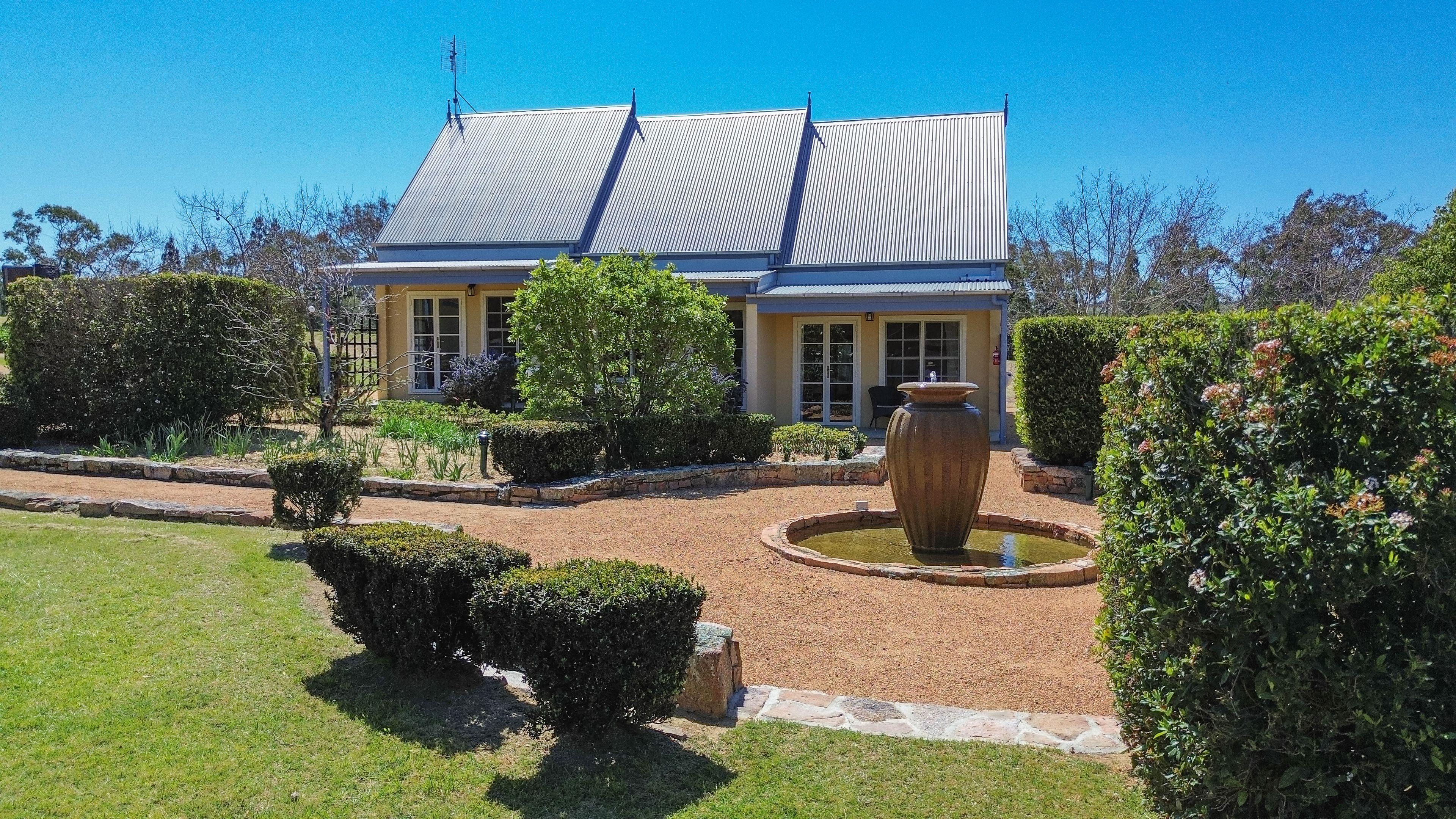 Vineyard Cottages & Café - where country charm meets commercial opportunity at the gateway to Queensland's Granite Belt.