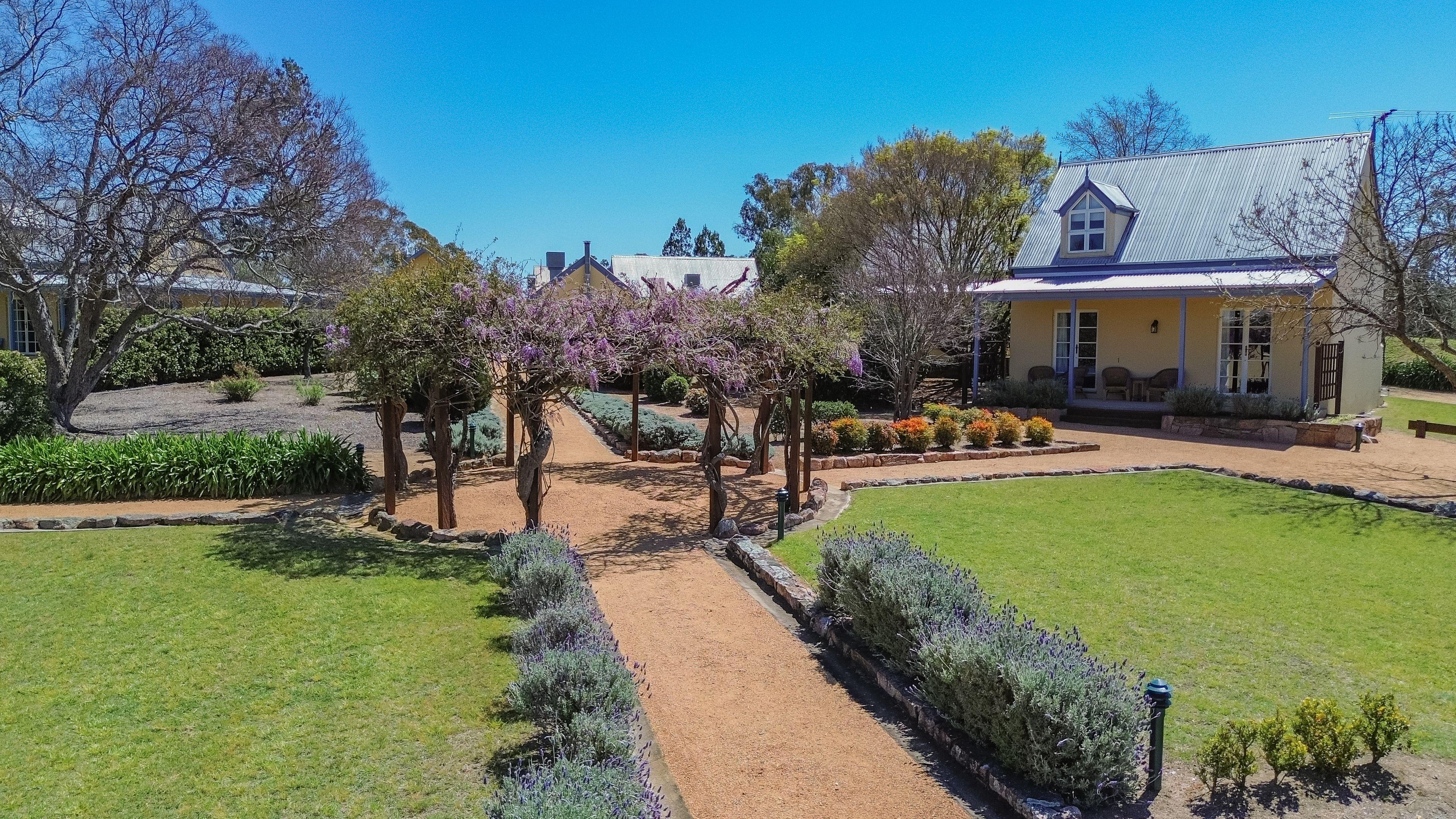 Vineyard Cottages & Café - where country charm meets commercial opportunity at the gateway to Queensland's Granite Belt.