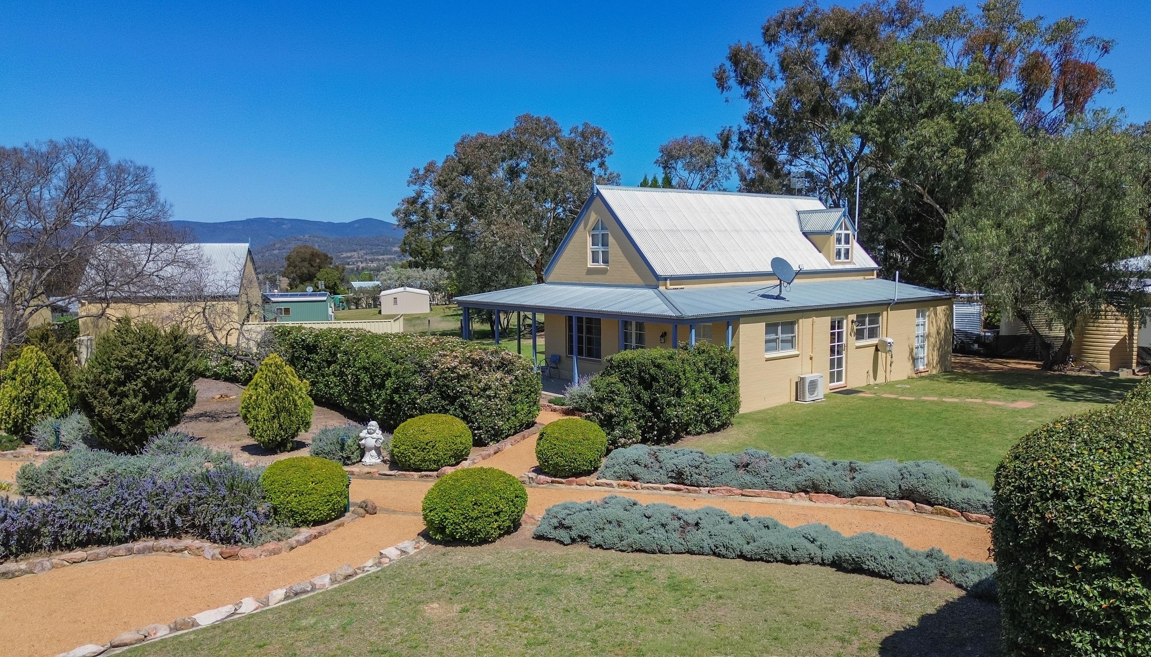 Vineyard Cottages & Café - where country charm meets commercial opportunity at the gateway to Queensland's Granite Belt.