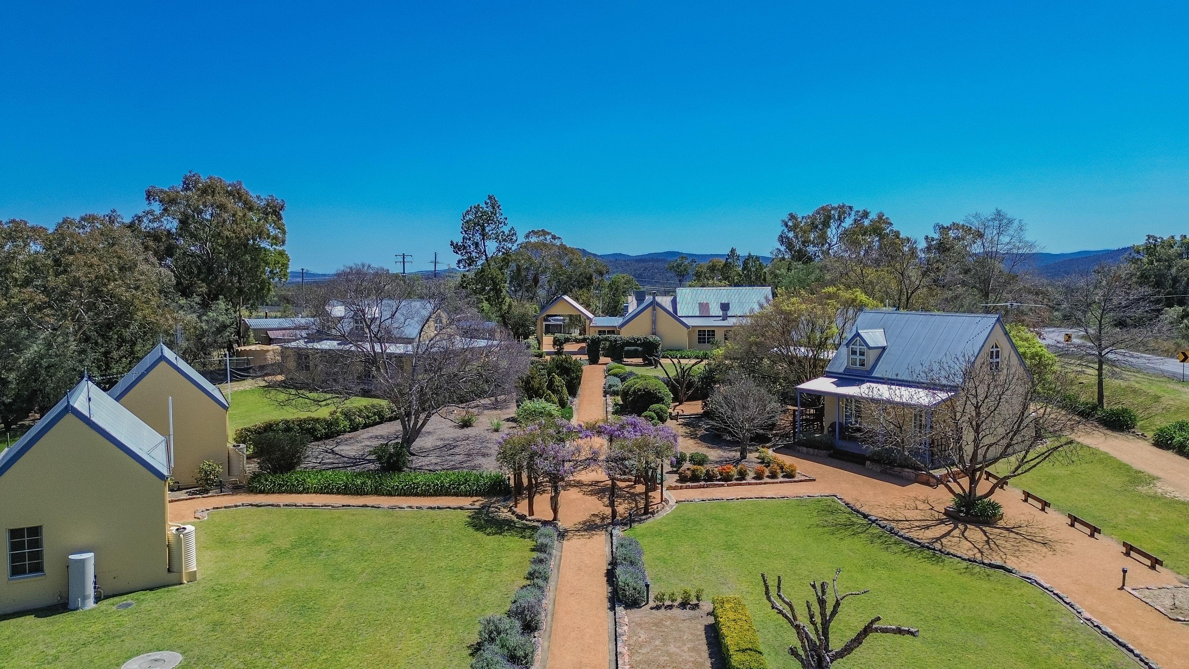 Vineyard Cottages & Café - where country charm meets commercial opportunity at the gateway to Queensland's Granite Belt.
