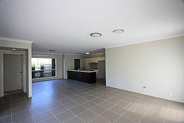 Prop-GPT: House: NSW Spring Farm, NSW 2570 Single Story Family Home