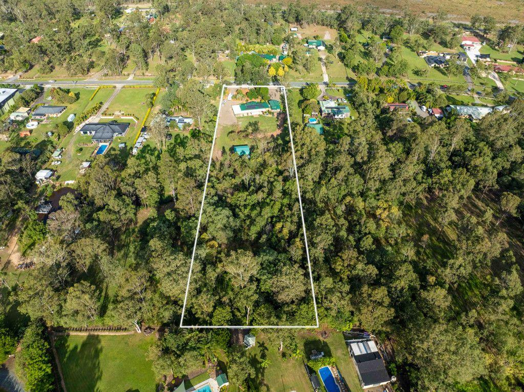 Rare Acerage Opportunity in Flagstone- TEENAGE RETREAT!