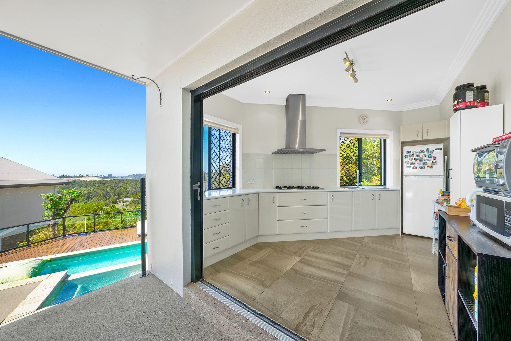 Dual Living Home with Skyline Views, Study, and Poolside Entertaining