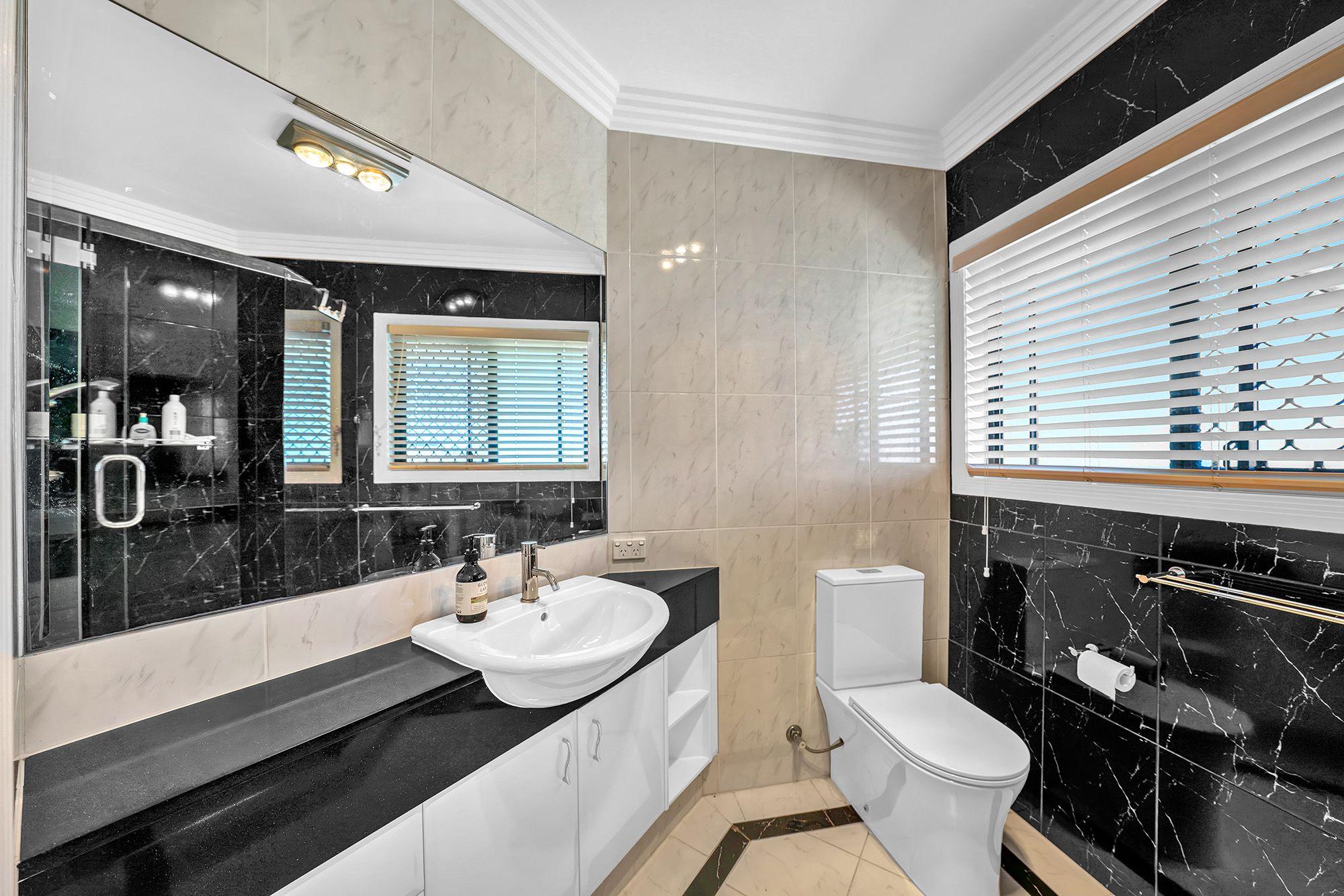 Dual Living Home with Skyline Views, Study, and Poolside Entertaining