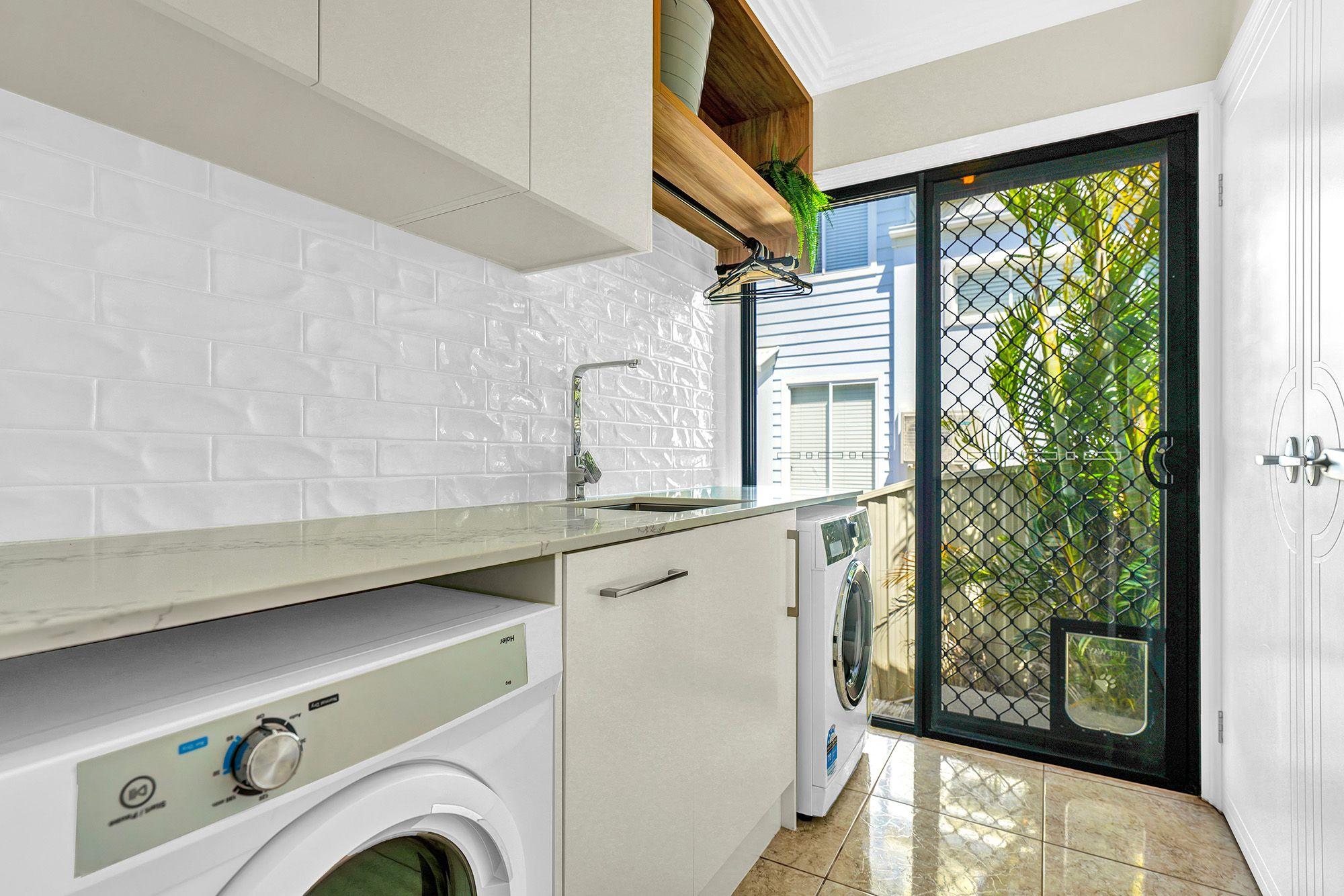 Dual Living Home with Skyline Views, Study, and Poolside Entertaining