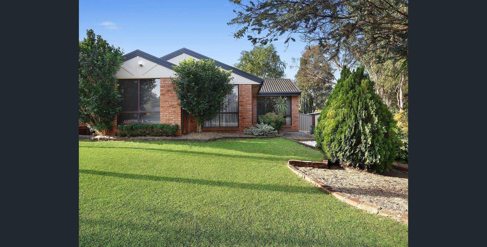 Prop-GPT: House: NSW Mount Annan, NSW 2567 Charming 3-Bedroom Home