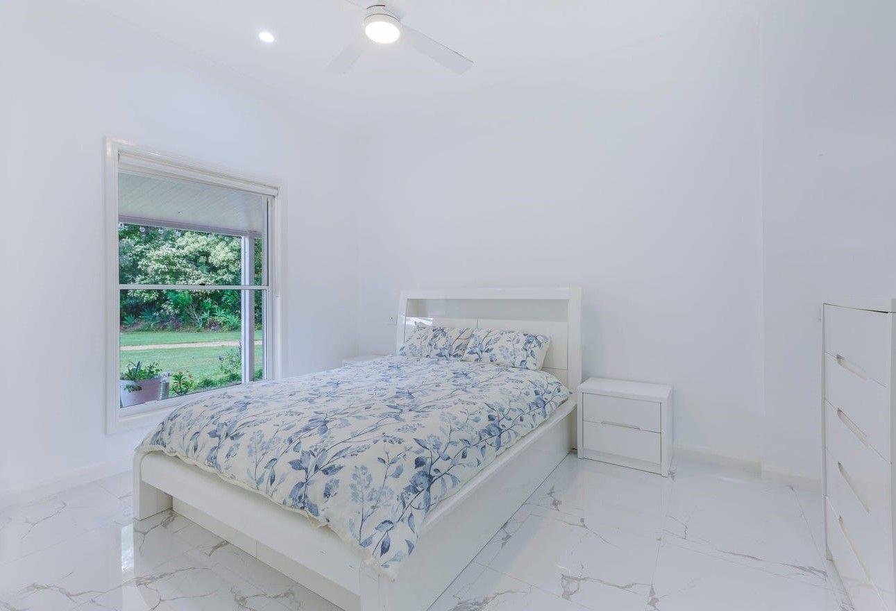 Elegant Furnished Acreage Home Offering Ultimate Family Comfort