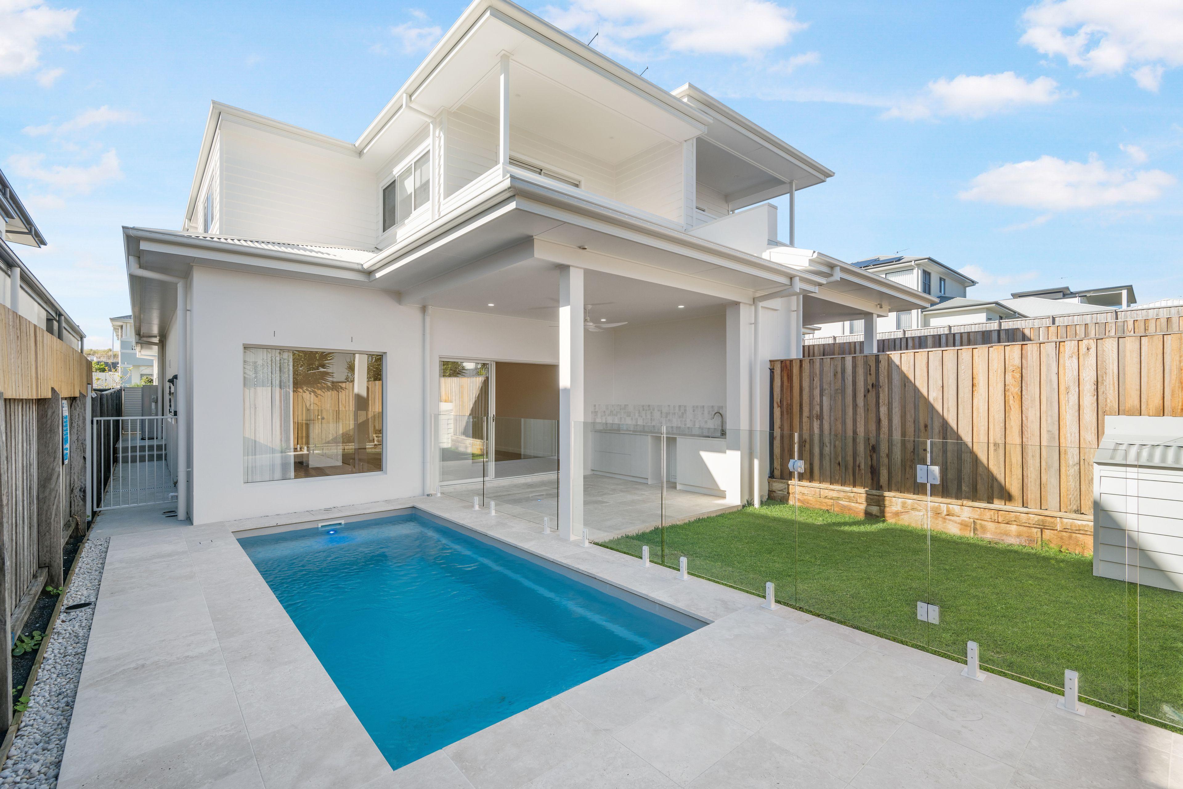 Coastal Living at Its Finest - Modern 3-Bedroom Duplex Steps from the Beach