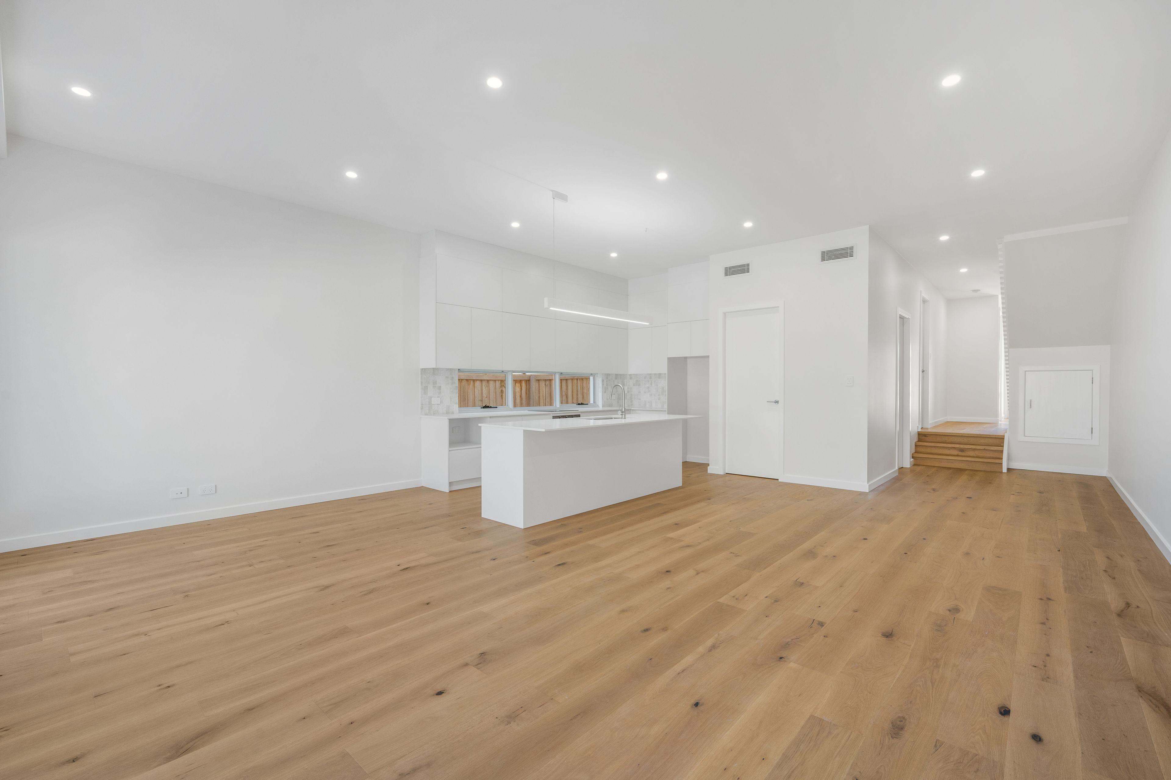 Coastal Living at Its Finest - Modern 3-Bedroom Duplex Steps from the Beach