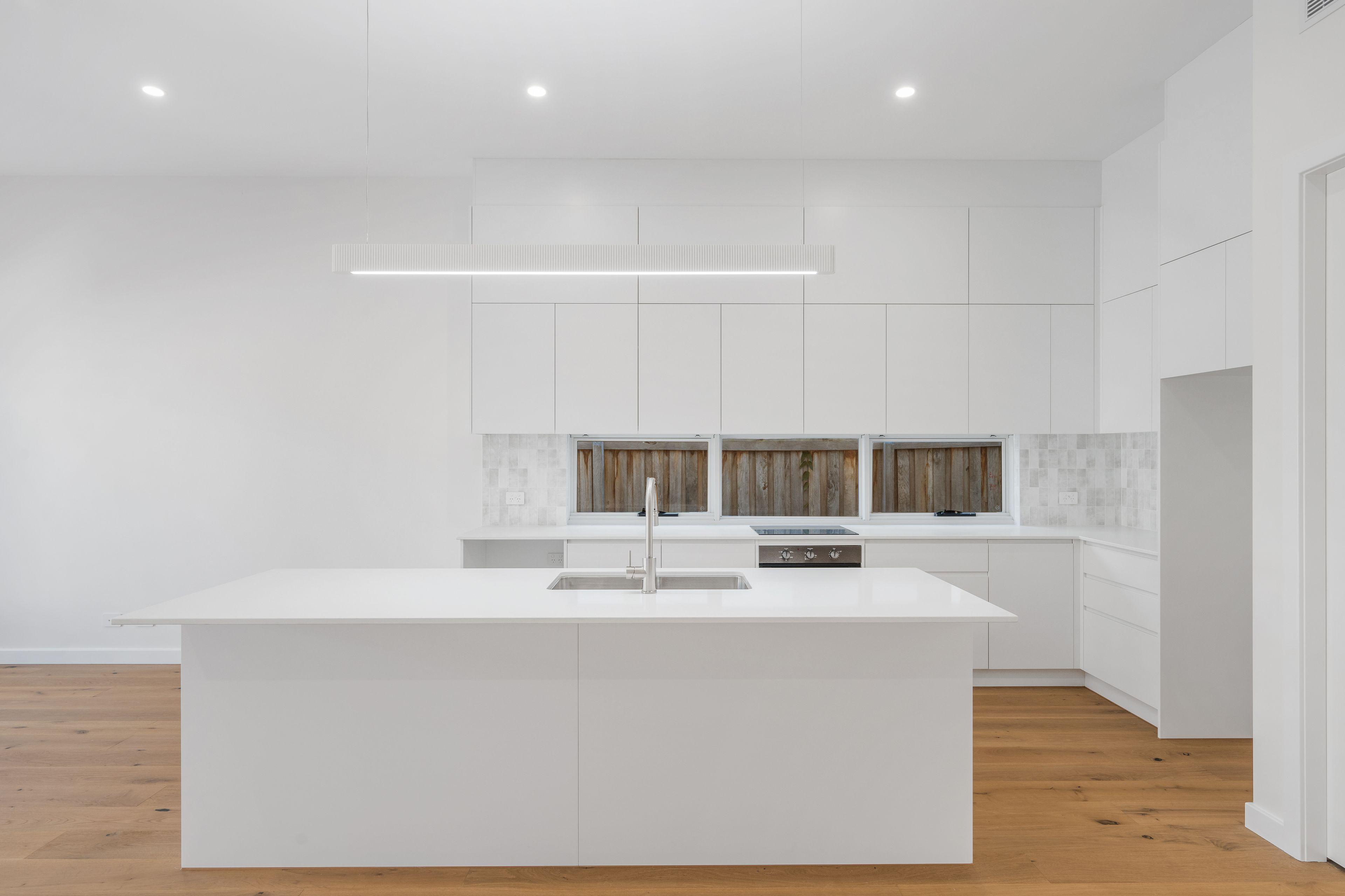 Coastal Living at Its Finest - Modern 3-Bedroom Duplex Steps from the Beach