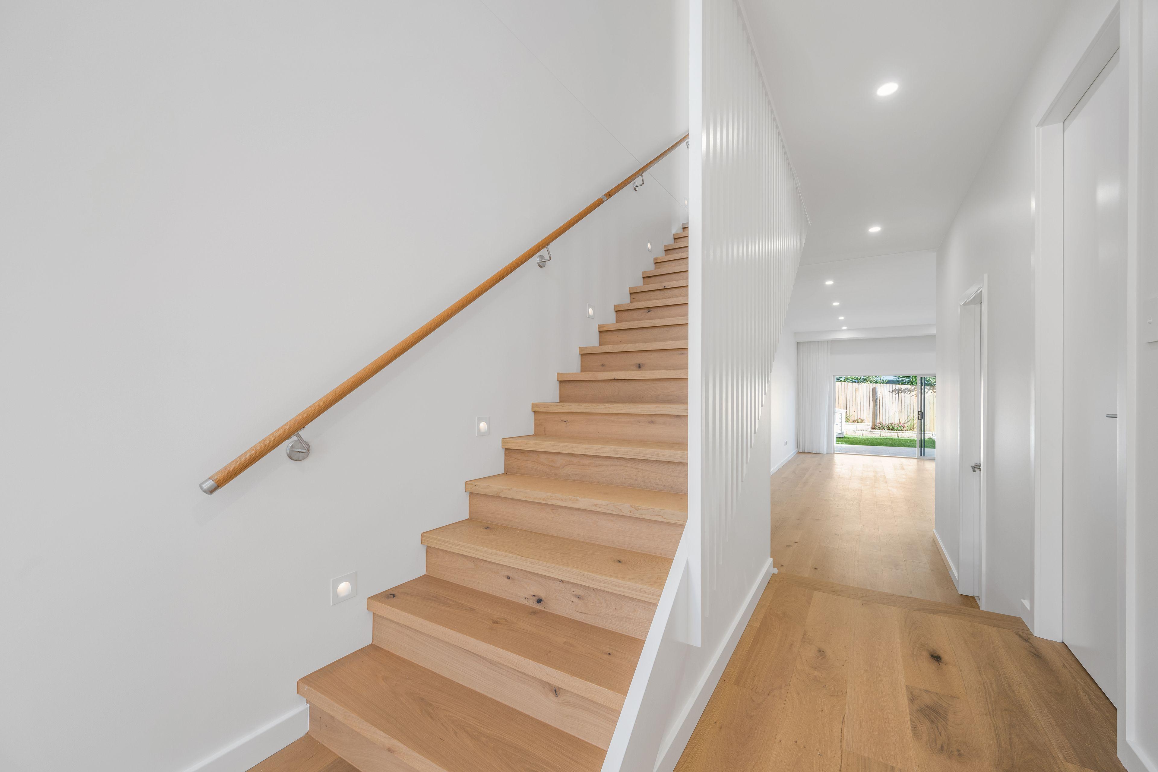 Coastal Living at Its Finest - Modern 3-Bedroom Duplex Steps from the Beach