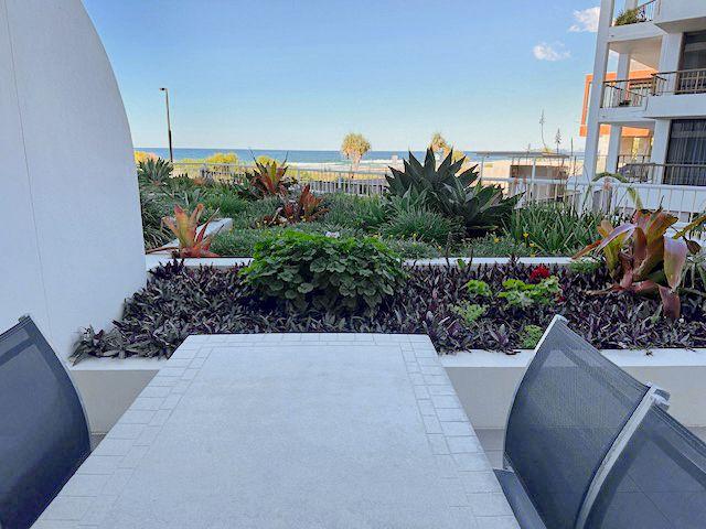 Fully Furnished Ground Floor Beachfront Apartment In Palm Beach!