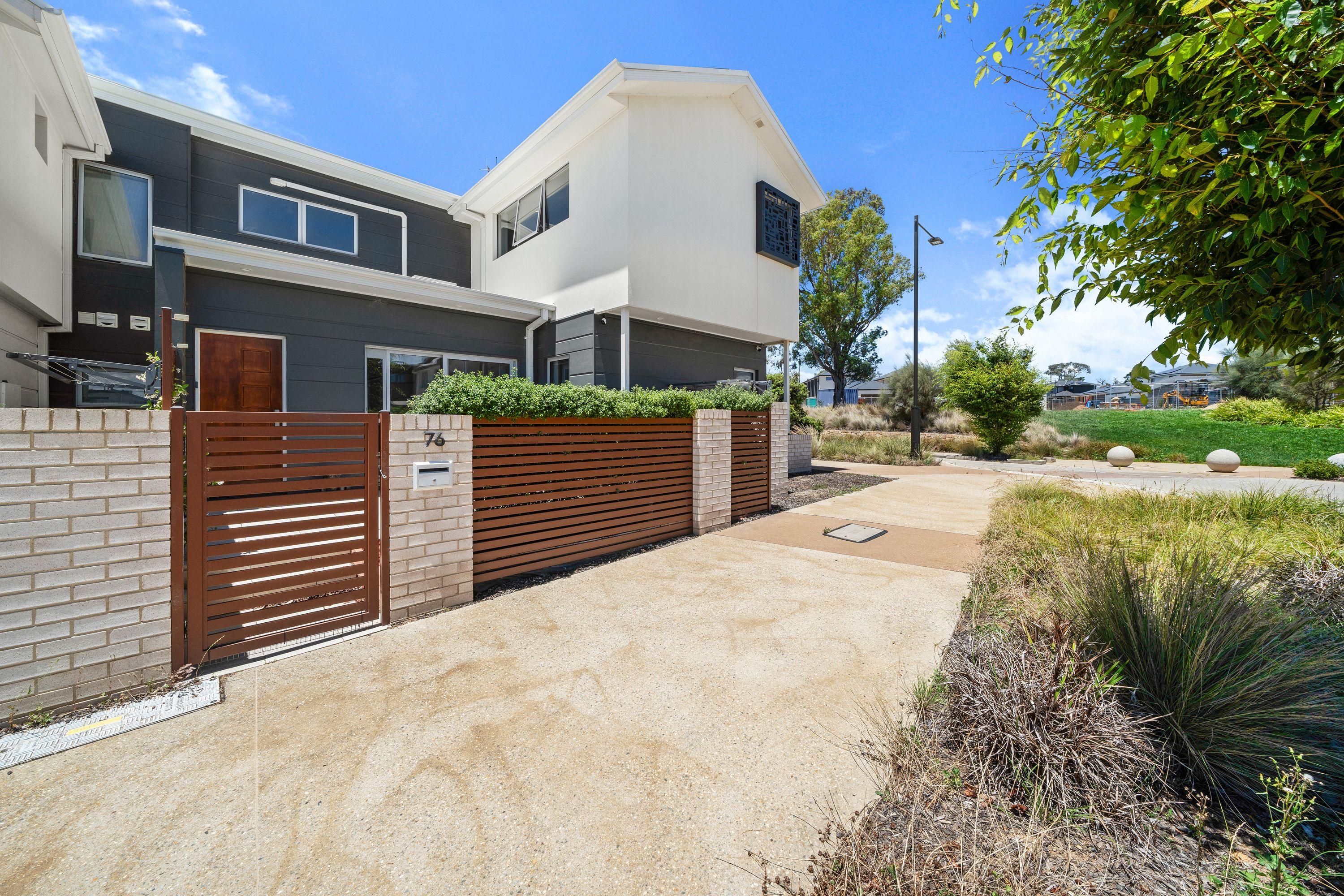 Prop-GPT: Townhouse: ACT Higgins, ACT 2615 Serene Townhouse Living, Surrounded By Nature