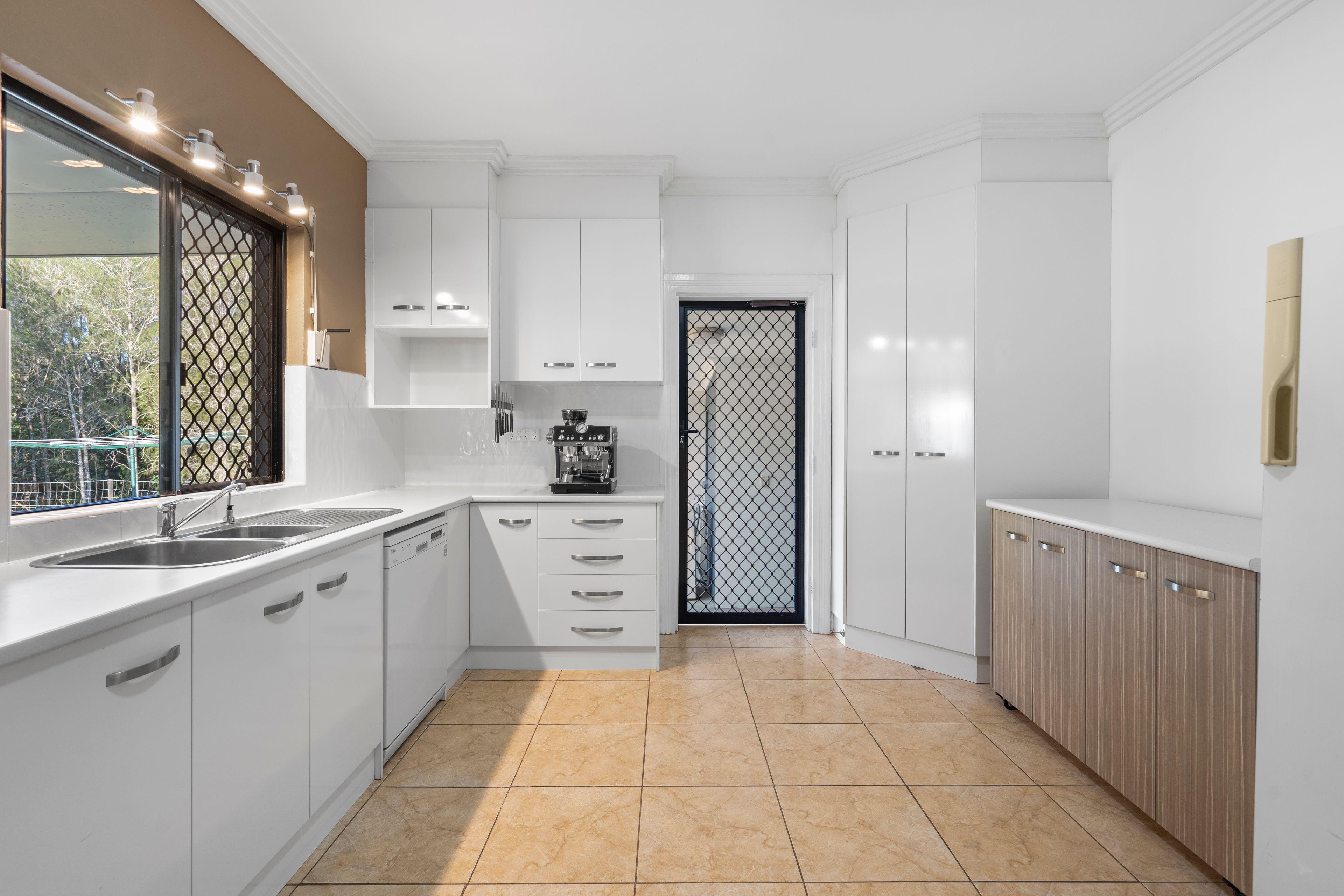 Spacious Family Home on Expansive Block with Dual Living & Bushland Outlook