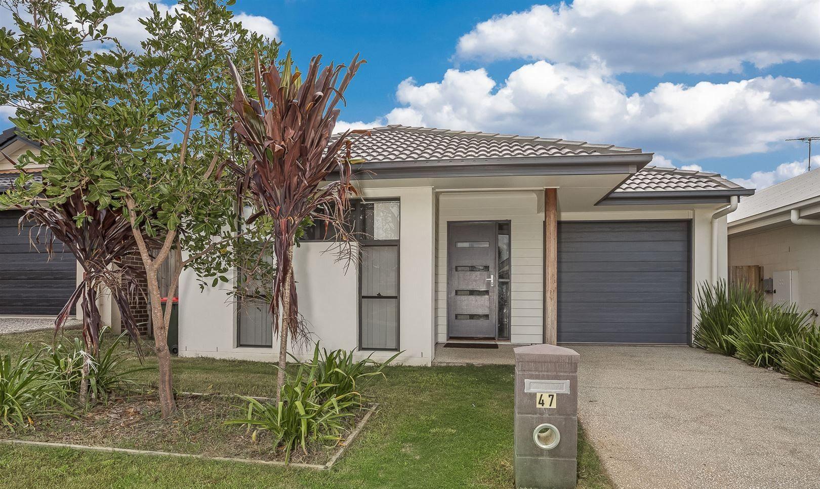 Prop-GPT: House: QLD North Lakes, QLD 4509 Spacious 4-Bedroom Home in North Lakes