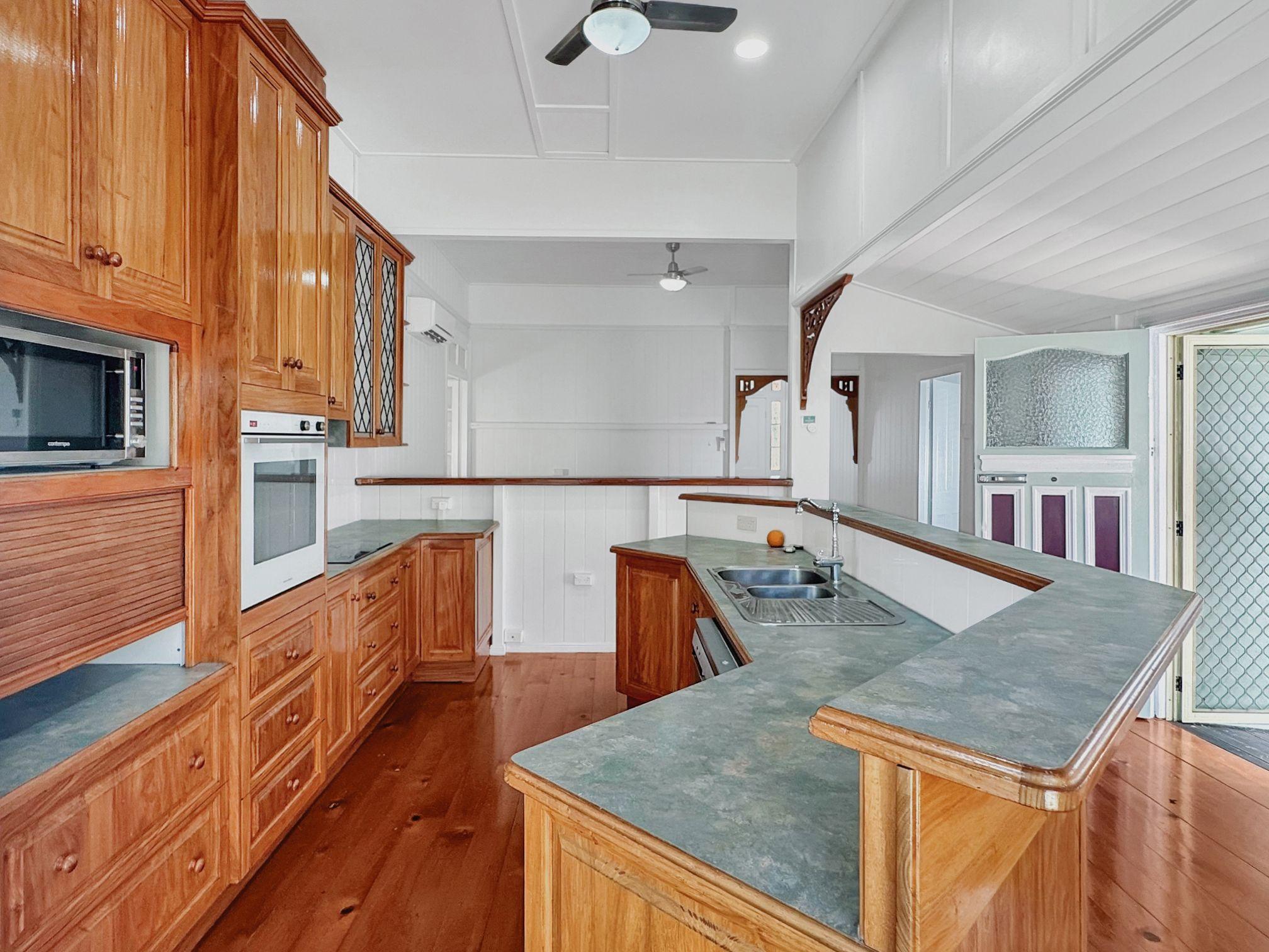 Stunning 4-Bedroom Queenslander for Rent - Prime Location!