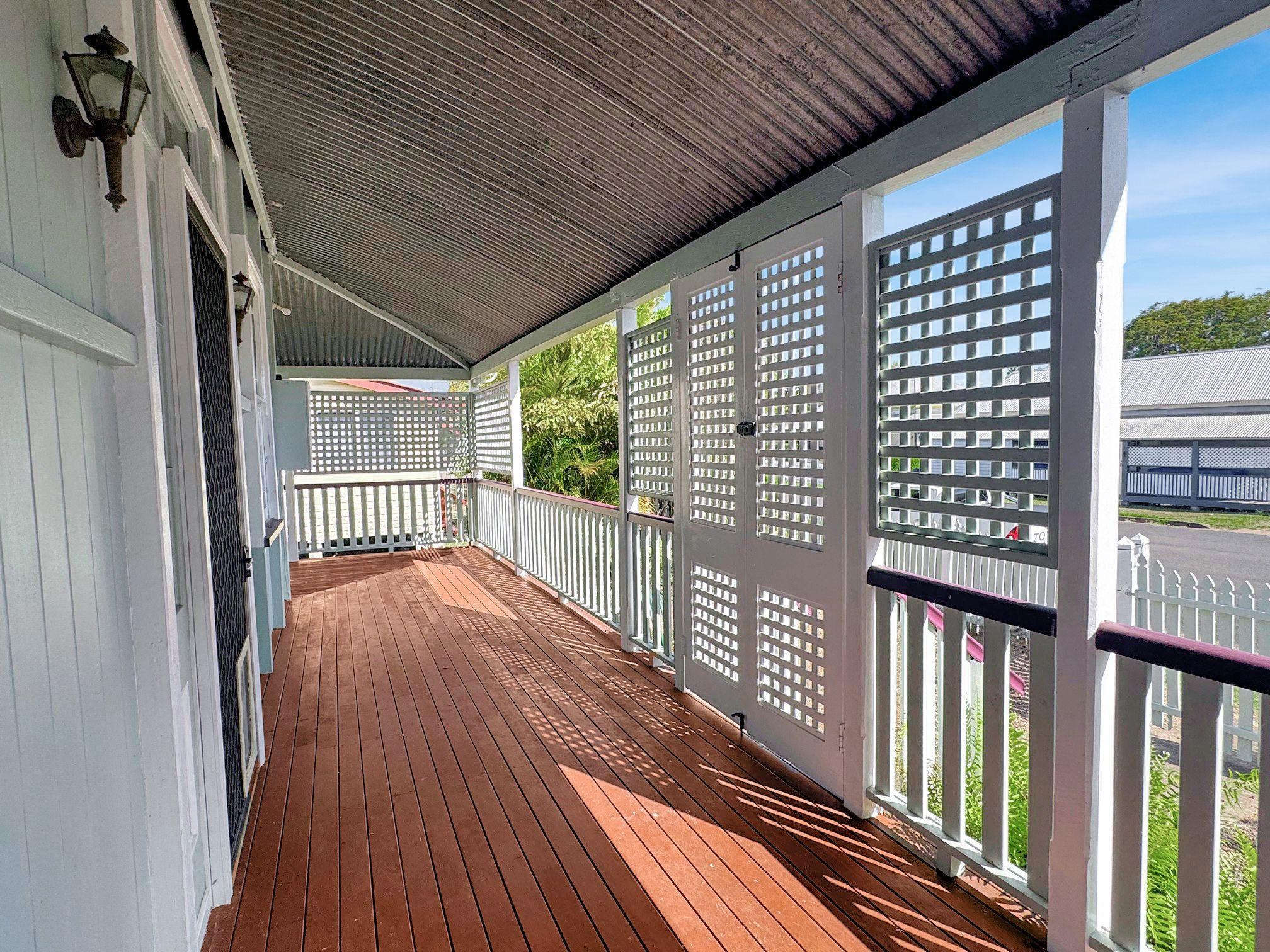 Stunning 4-Bedroom Queenslander for Rent - Prime Location!