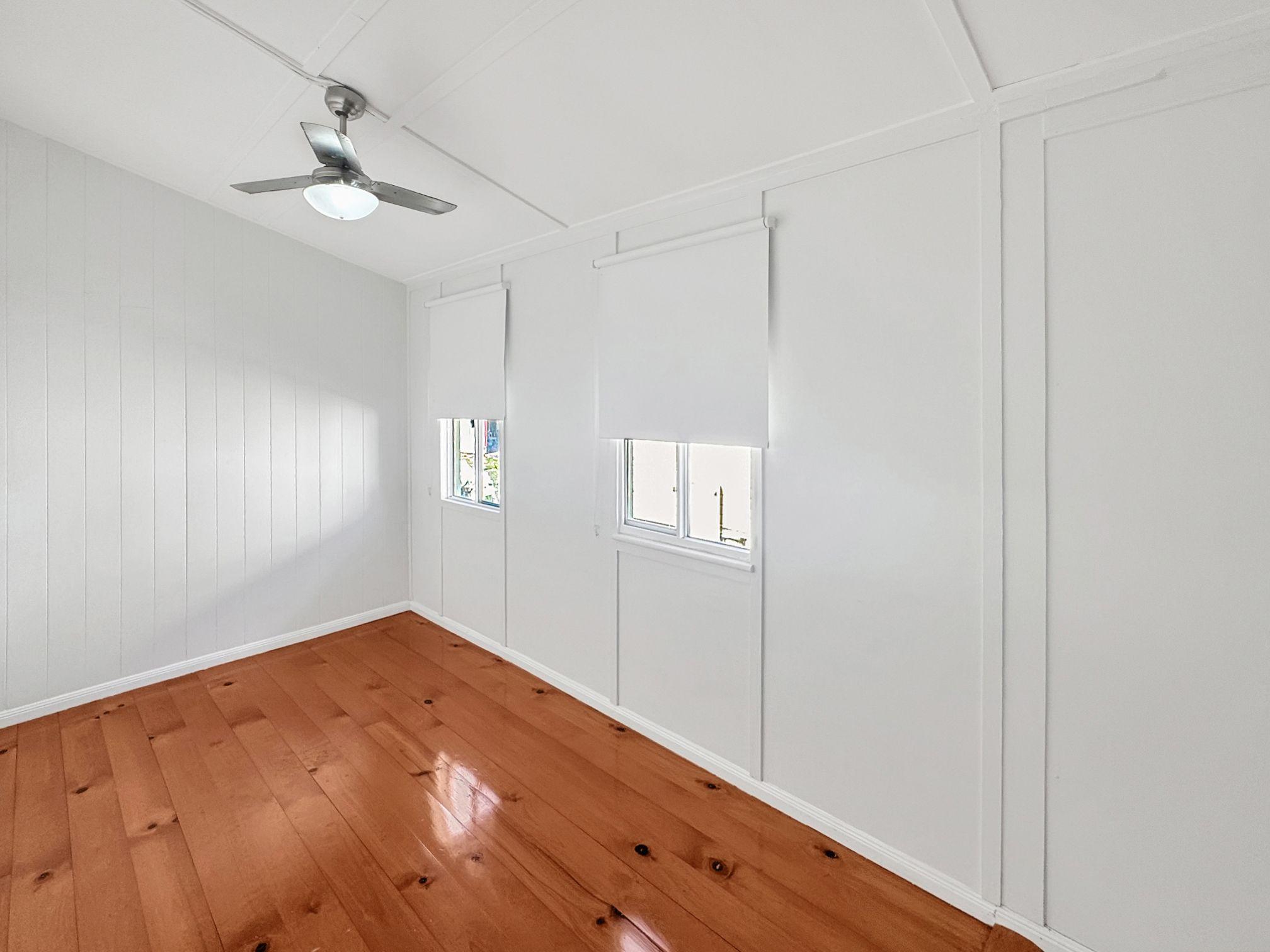Stunning 4-Bedroom Queenslander for Rent - Prime Location!