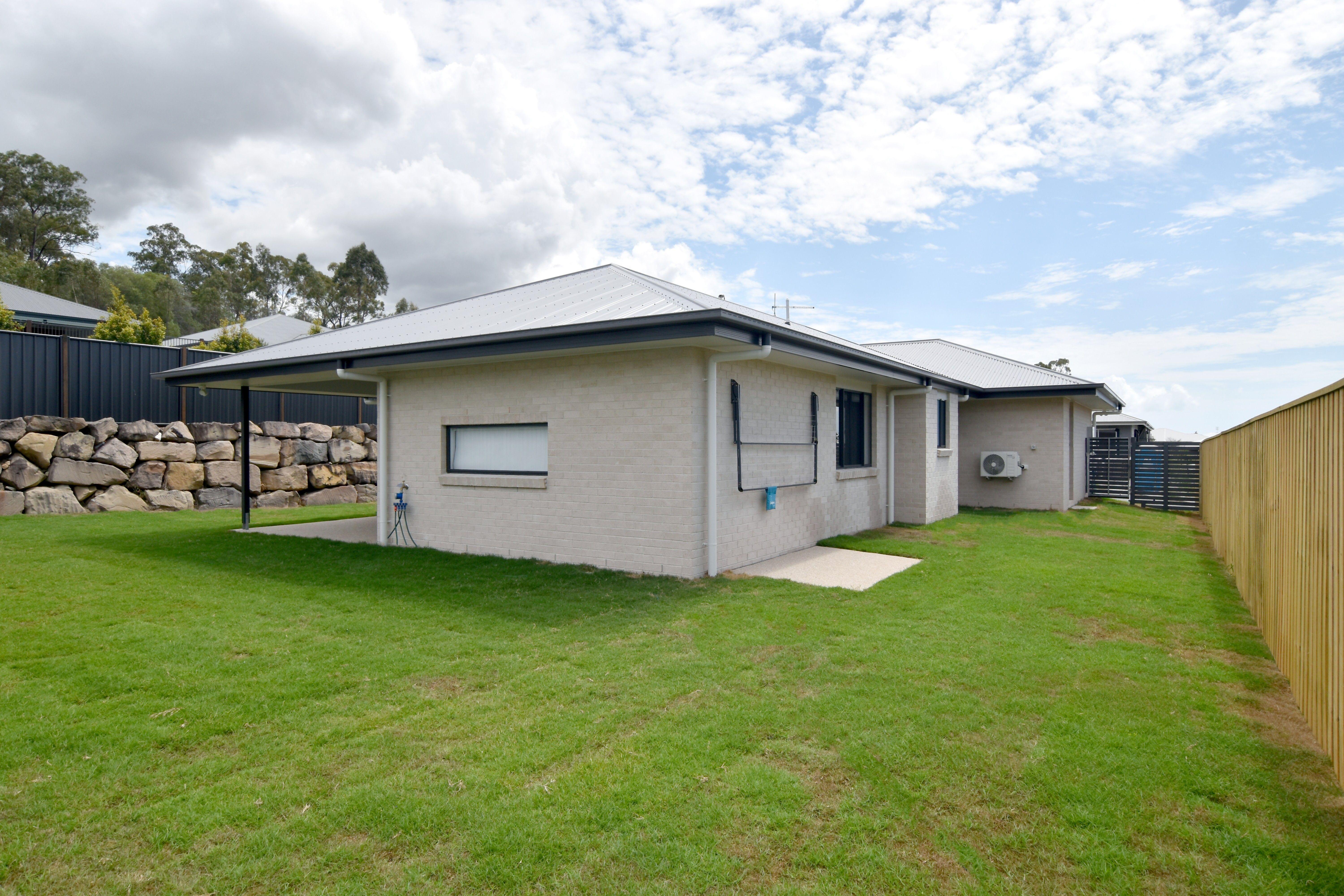 MODERN FOUR BEDROOM HOME IN THE HEART OF RIVERSTONE RISE