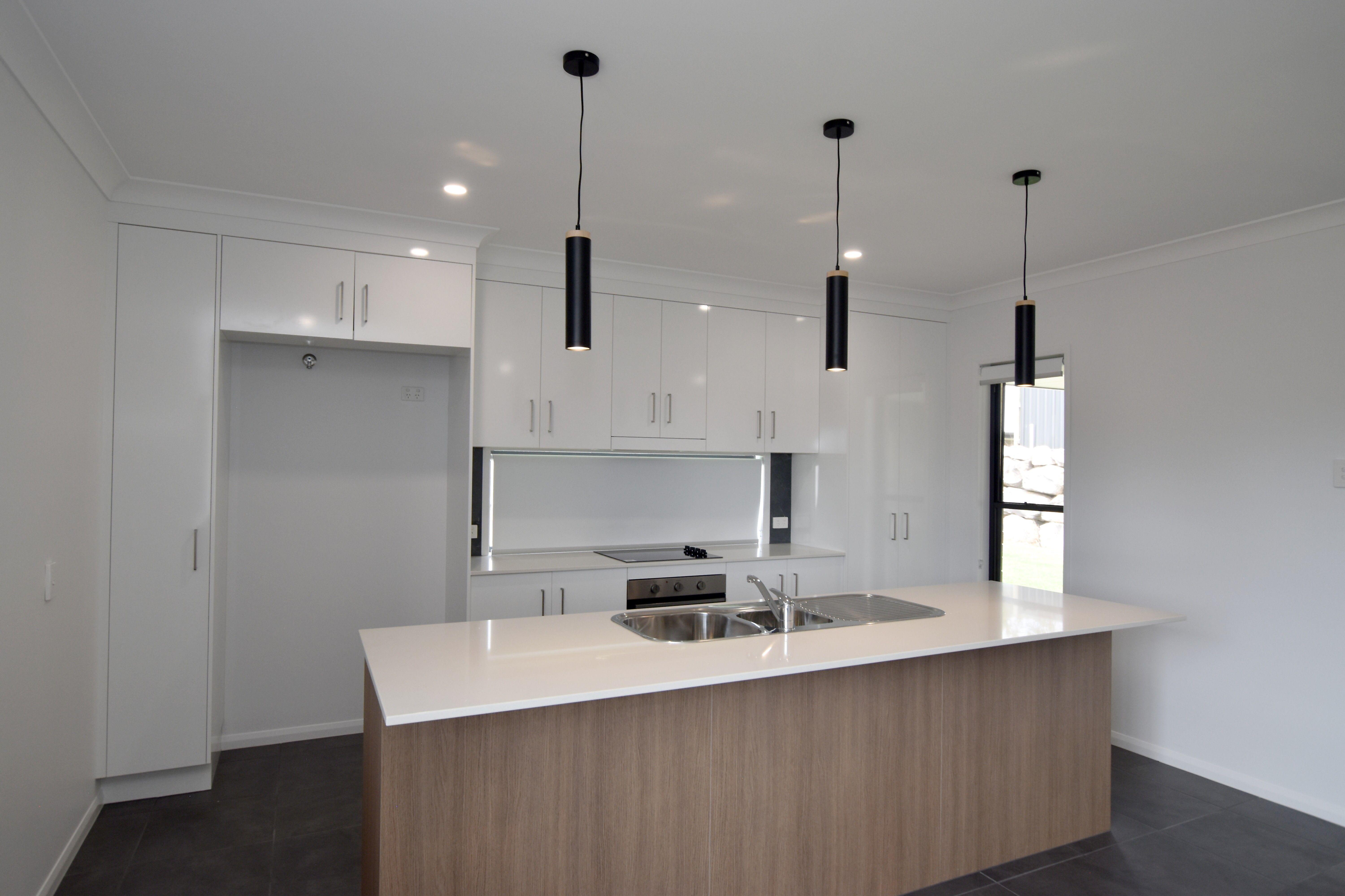 MODERN FOUR BEDROOM HOME IN THE HEART OF RIVERSTONE RISE