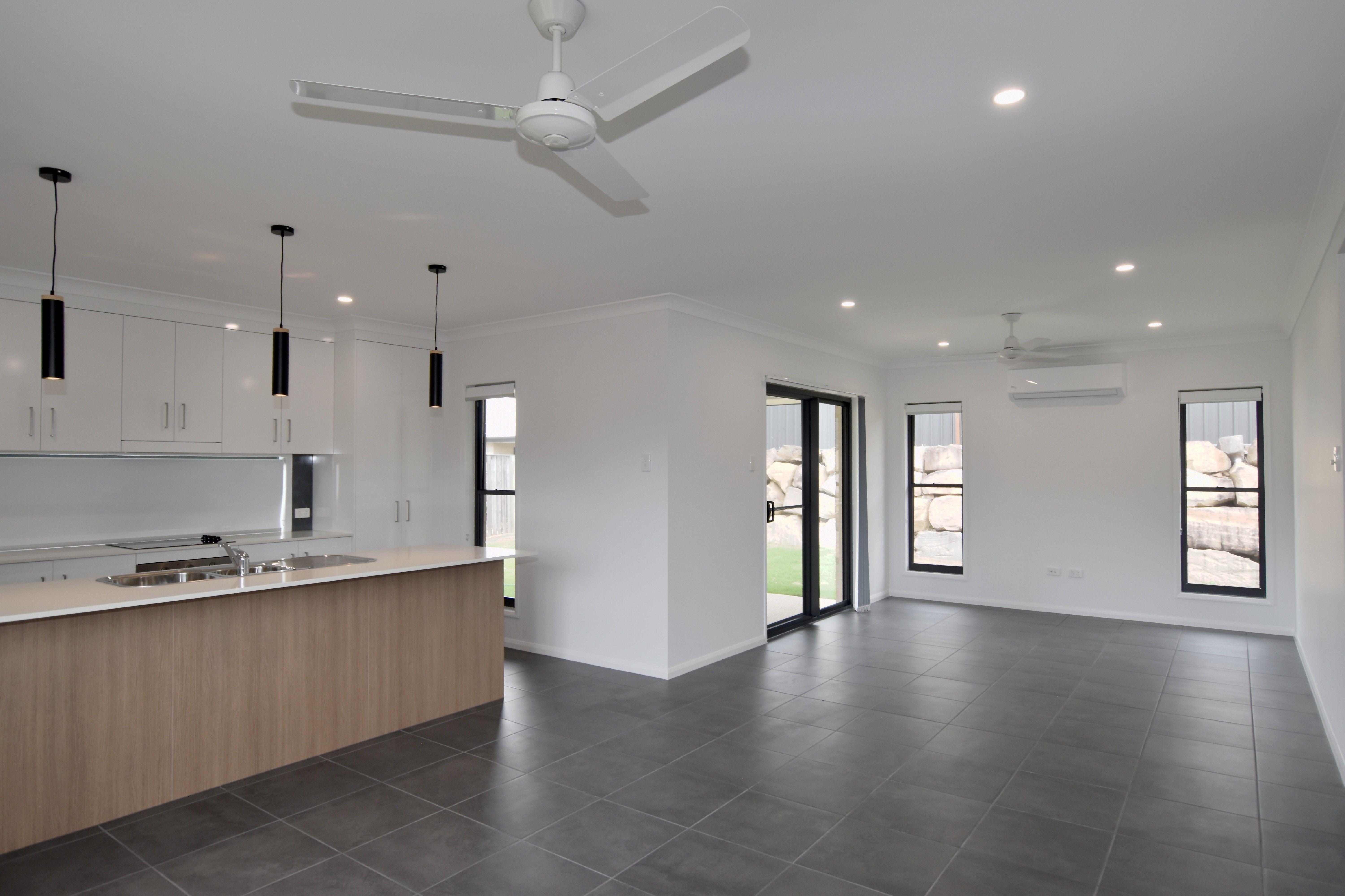 MODERN FOUR BEDROOM HOME IN THE HEART OF RIVERSTONE RISE